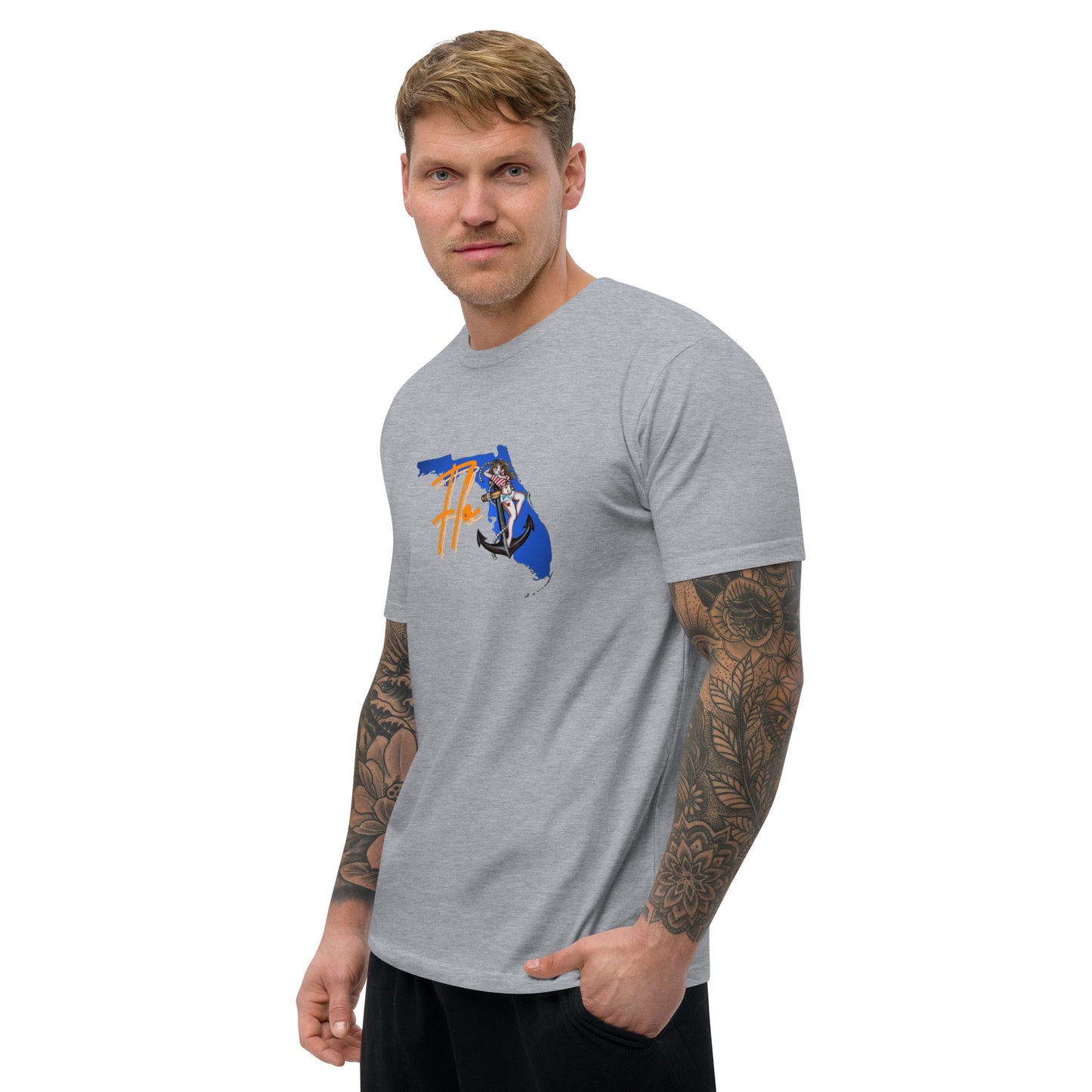 a man wearing a grey t - shirt with a picture of a tiger on it