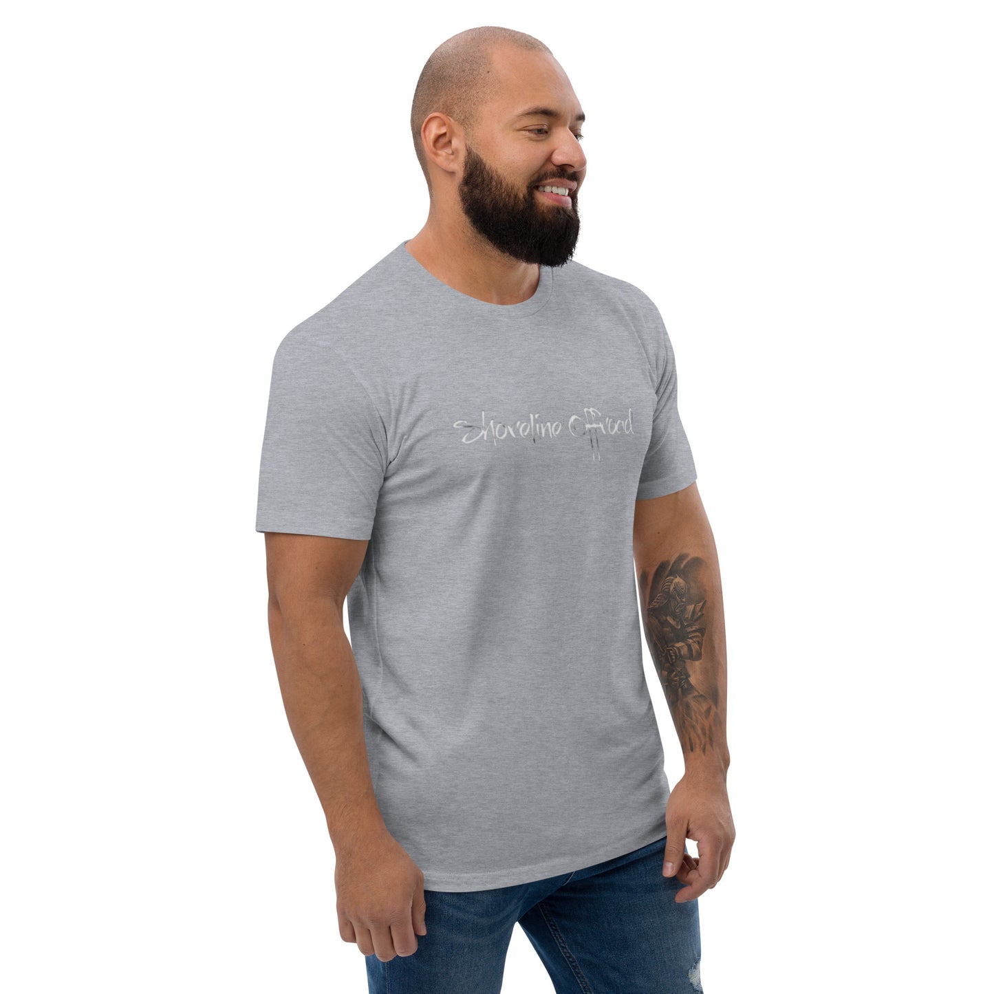 a man with a beard wearing a grey t - shirt