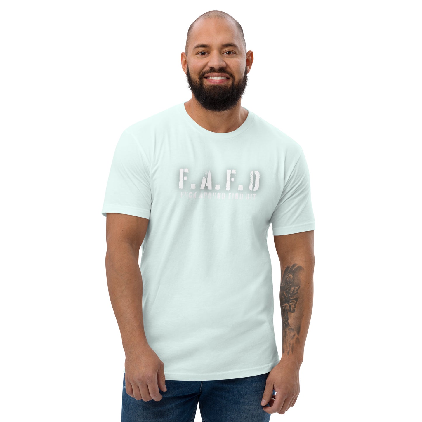 a man with a beard wearing a faded t - shirt