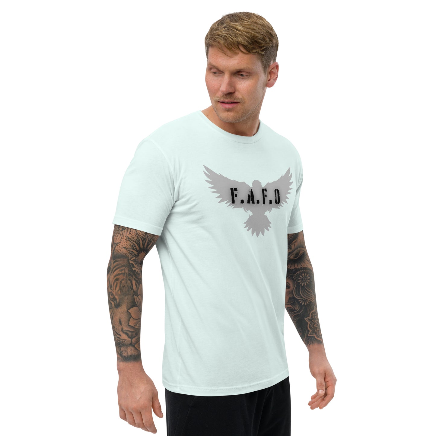 a man wearing a white t - shirt with the word fald on it