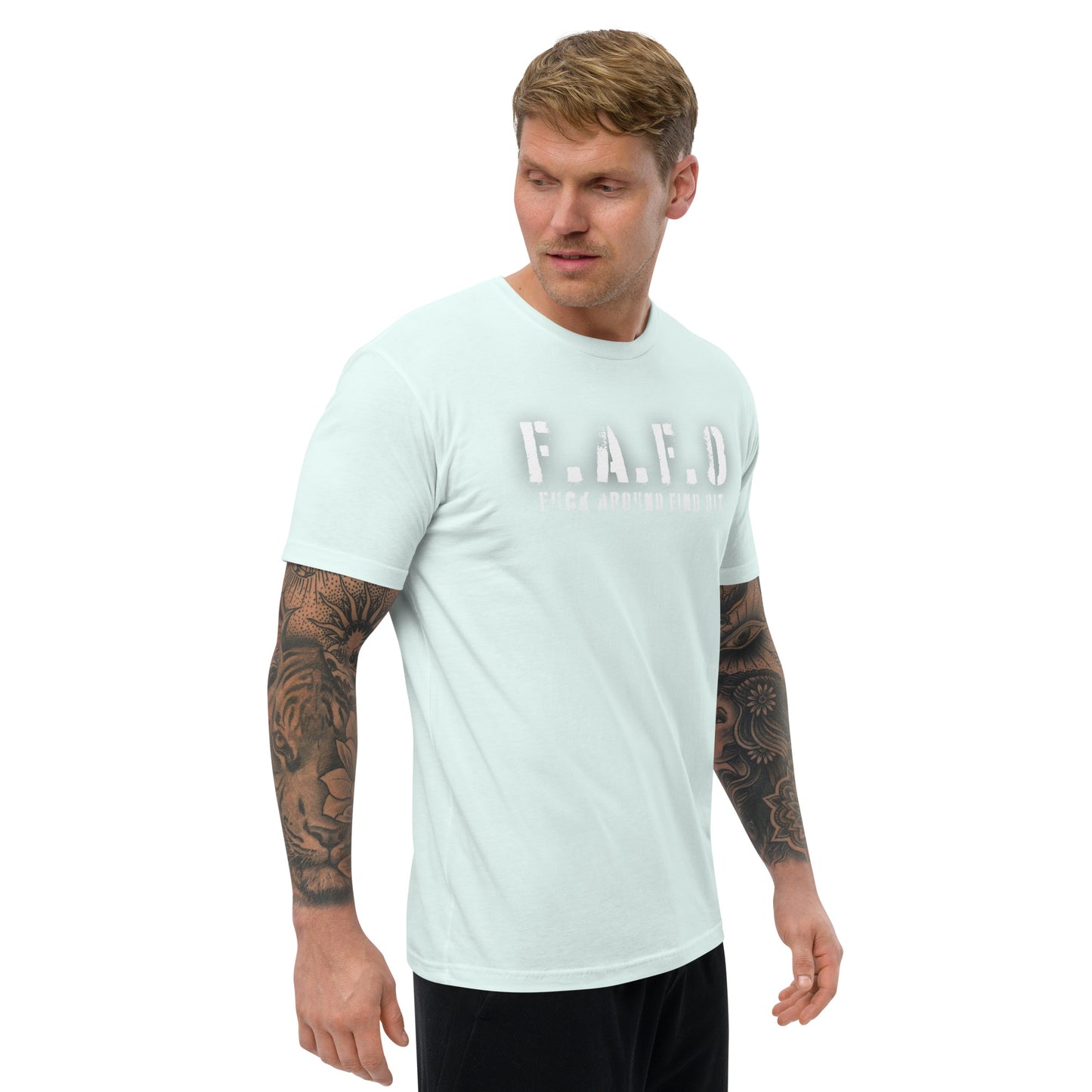 a man with a tattooed arm wearing a white t - shirt