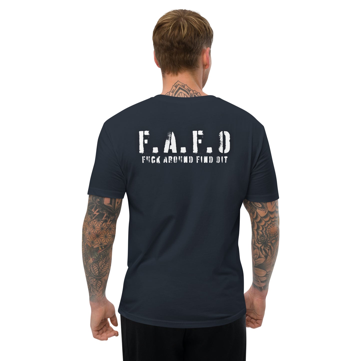 a man with a tattooed arm wearing a t - shirt that says f a d