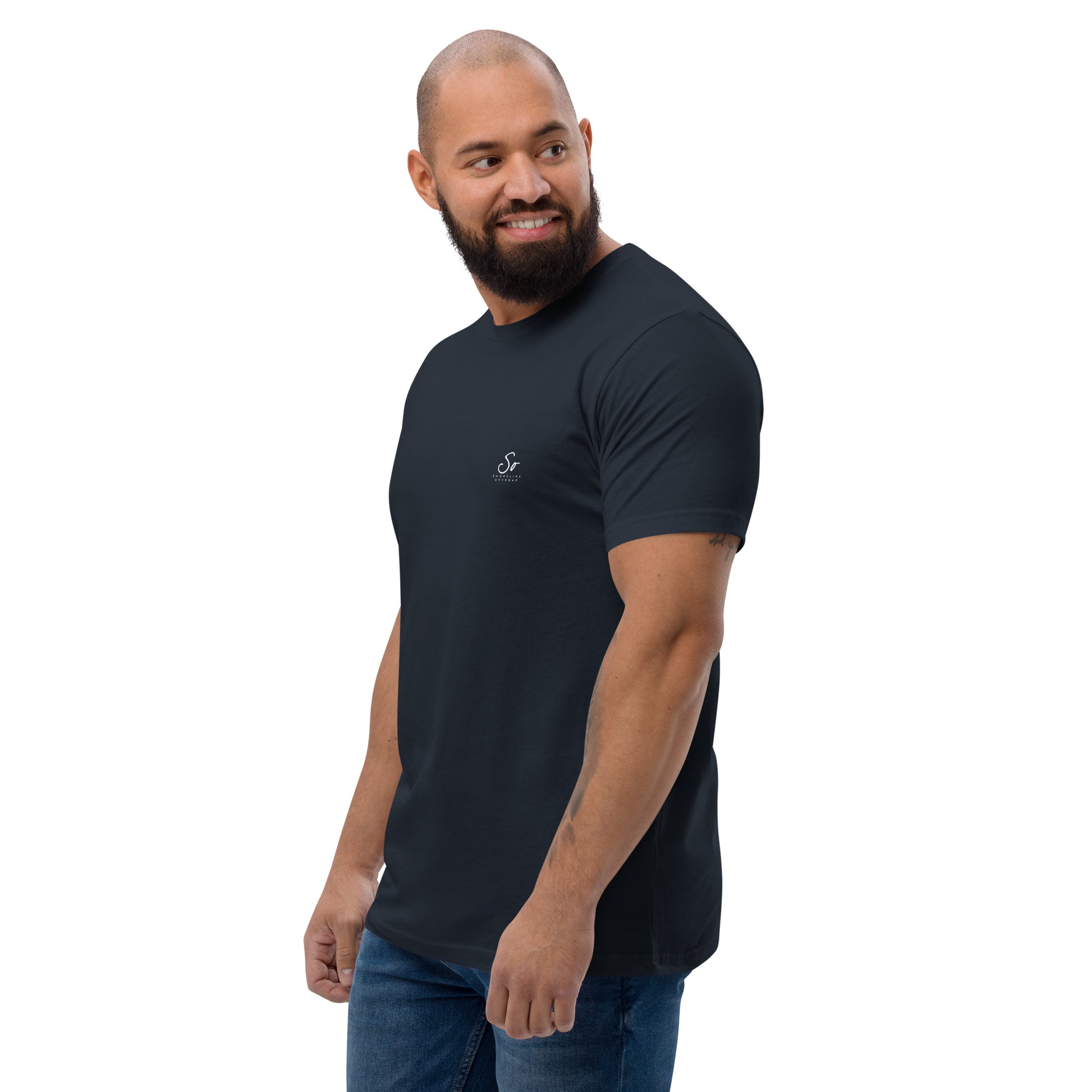 a man with a bald head wearing a black t - shirt