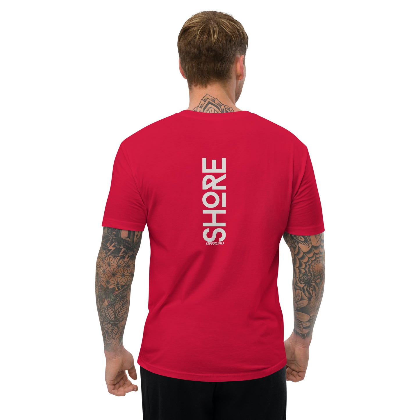 a man wearing a red shirt with the words shop on it