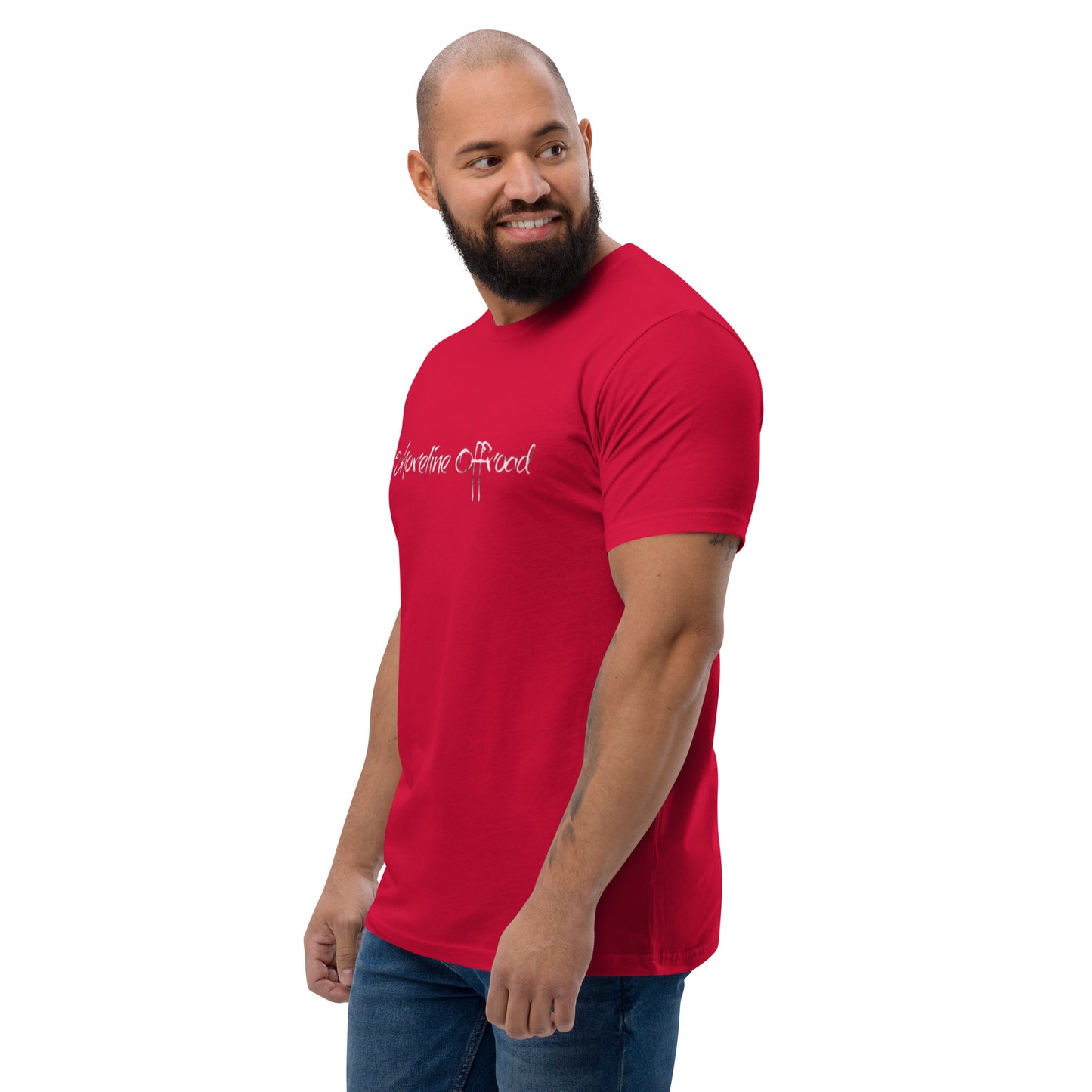 a man with a beard wearing a red shirt