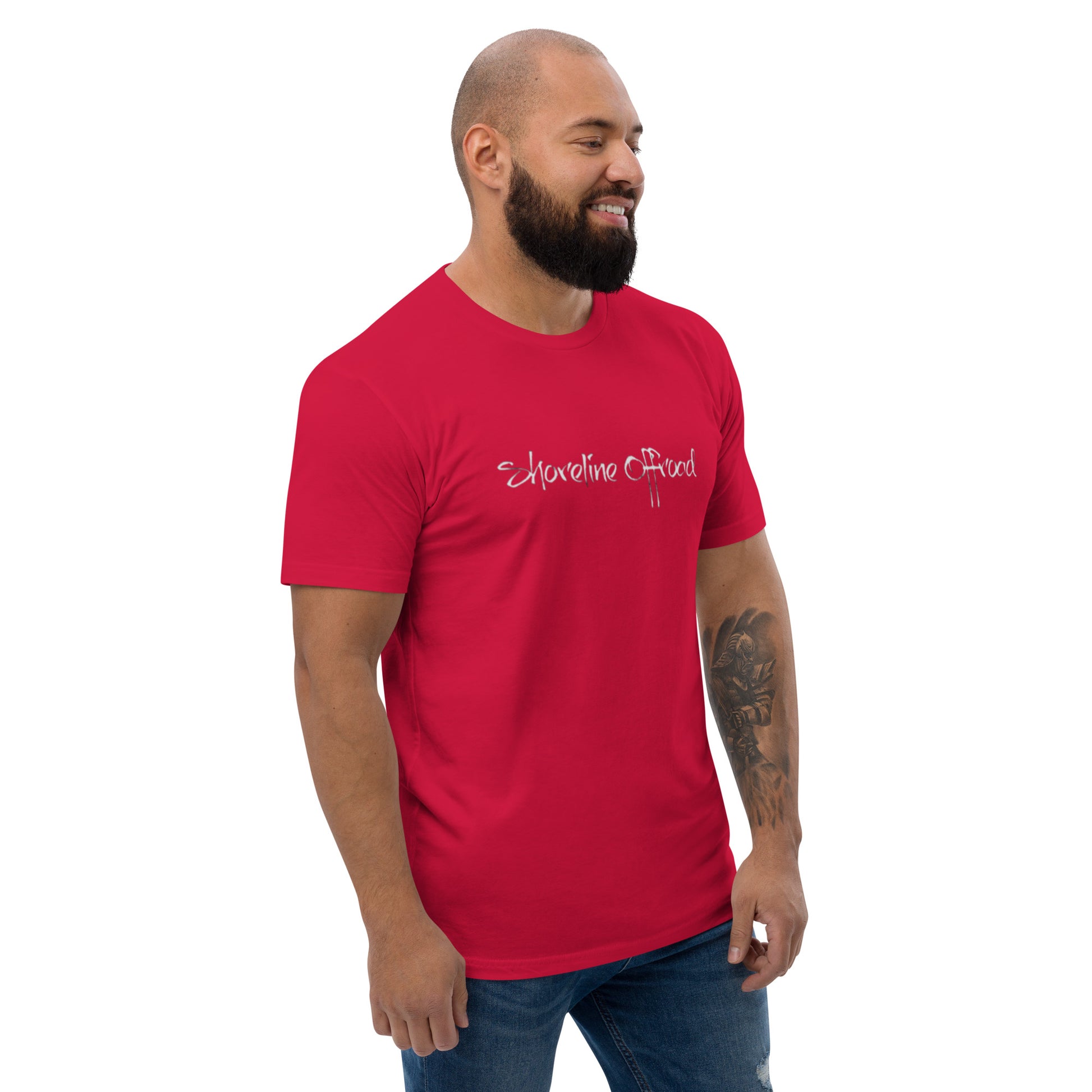 a man with a beard wearing a red t - shirt