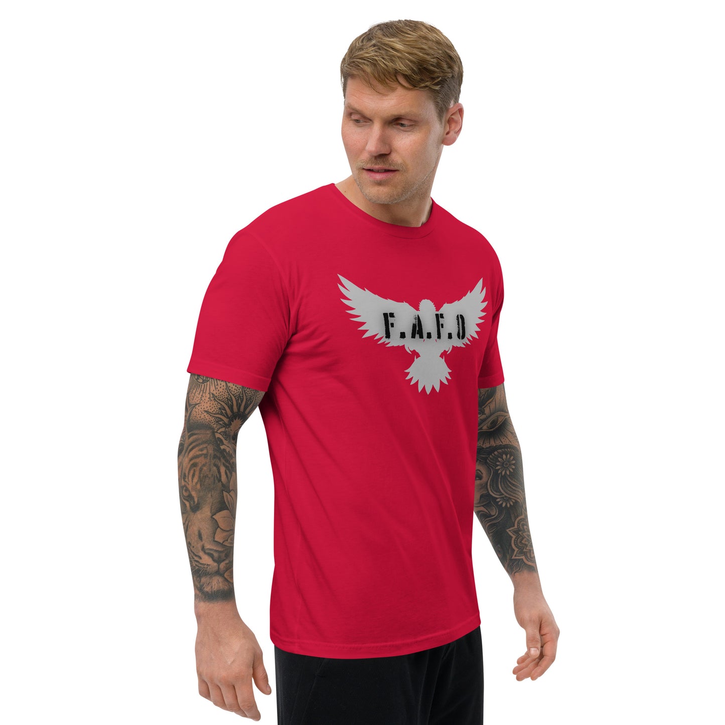 a man wearing a red shirt with a bird on it