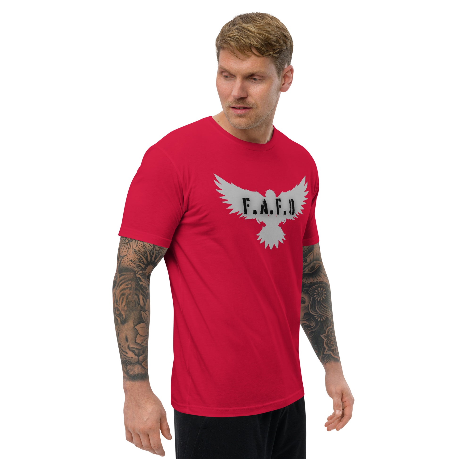 a man wearing a red shirt with a bird on it