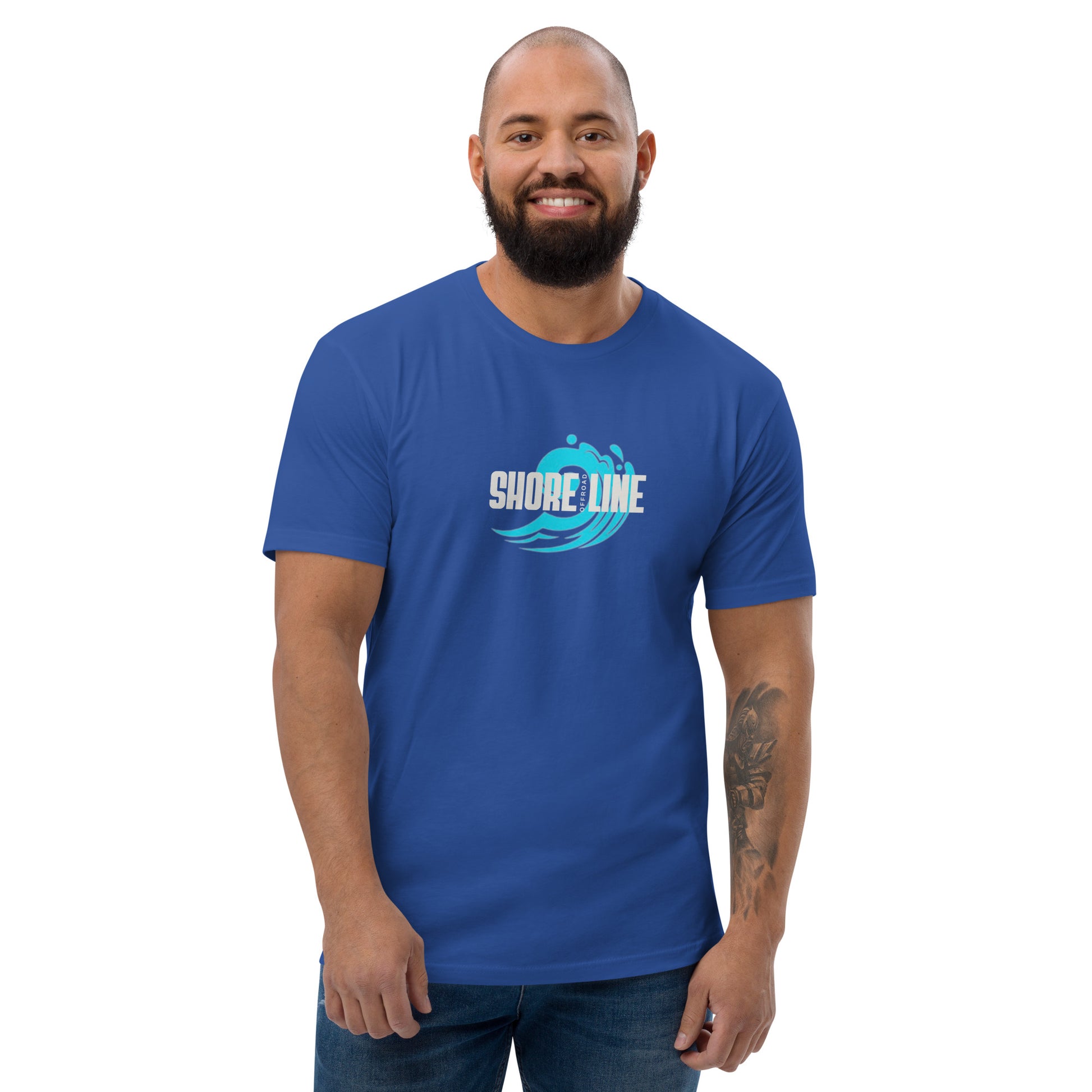 a man wearing a blue shirt that says shore line