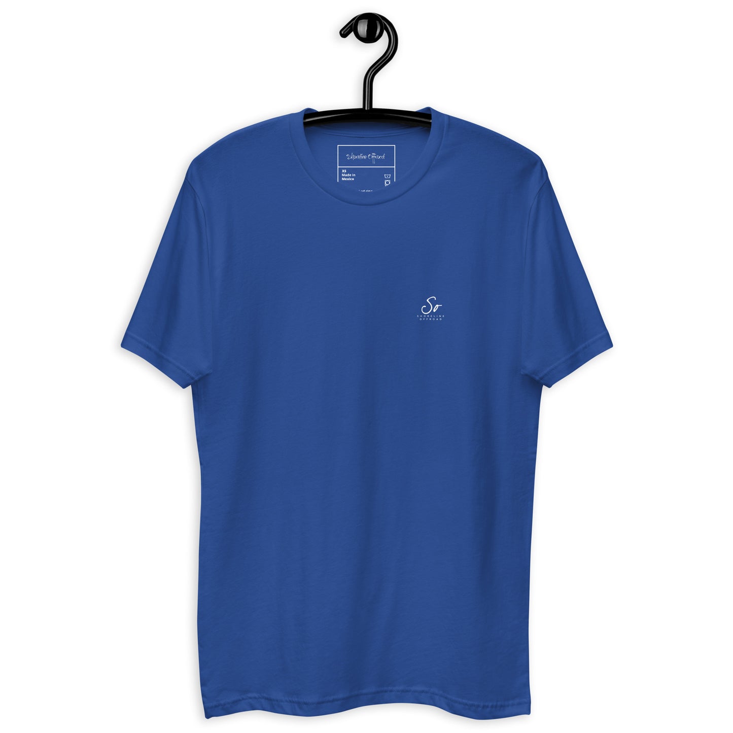 a blue t - shirt hanging on a hanger