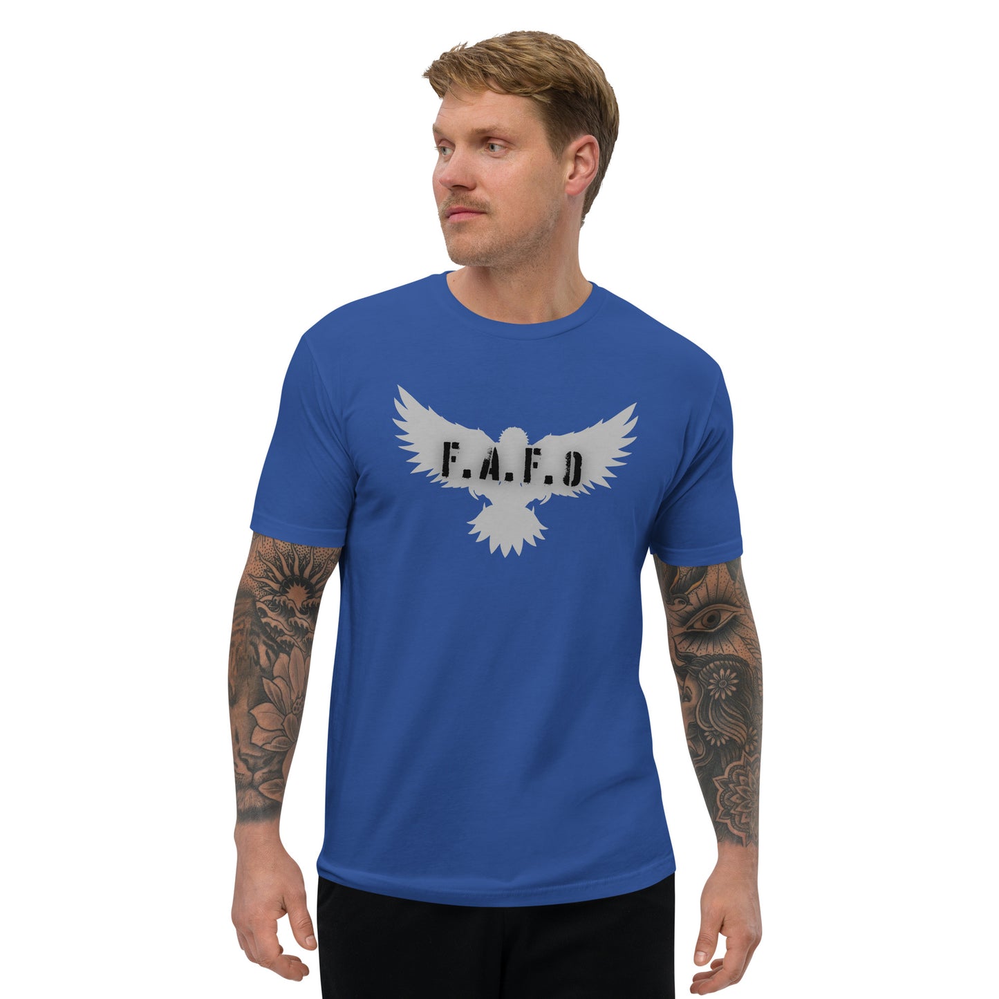 a man wearing a blue t - shirt with a white eagle on it