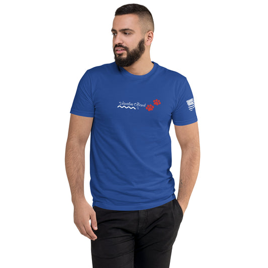 a man with a beard wearing a blue t - shirt