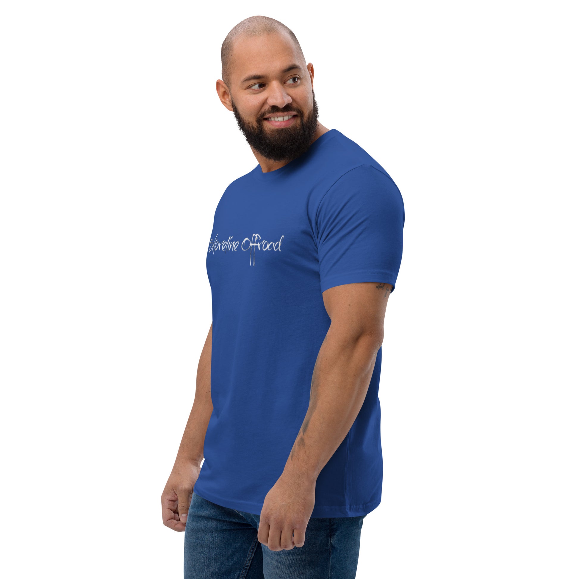 a man with a beard wearing a blue shirt