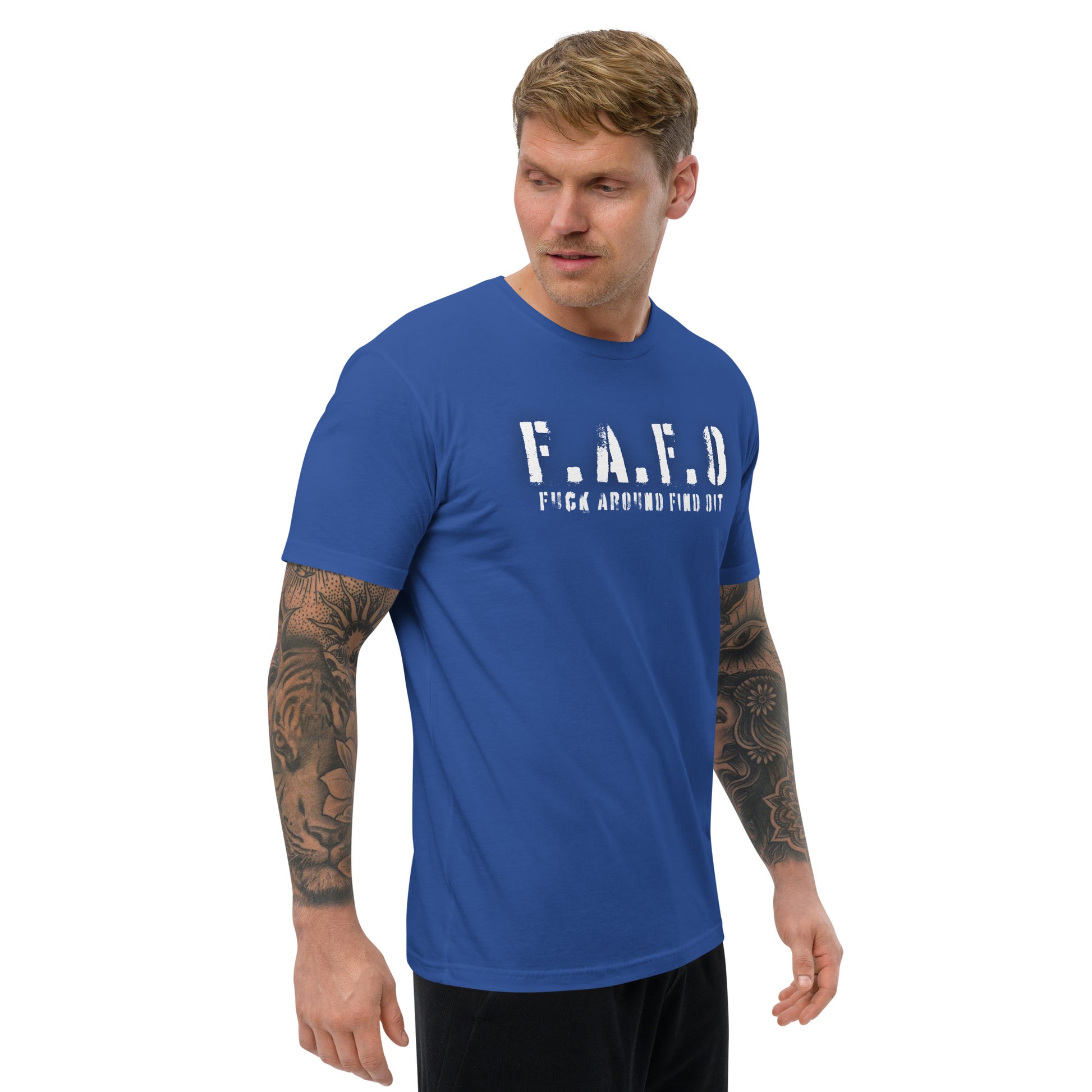 a man wearing a blue t - shirt with the word f a f d on