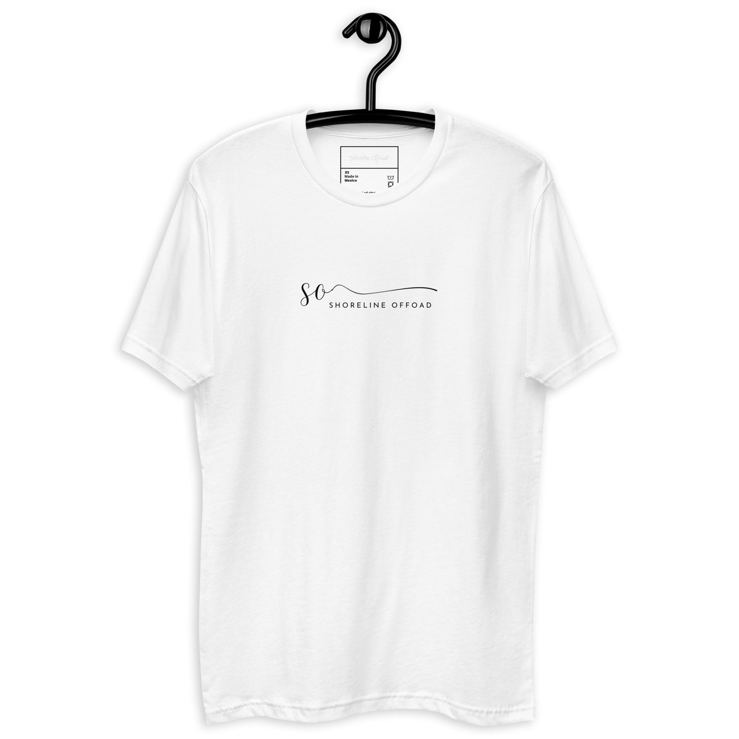 a white t - shirt hanging on a black hanger