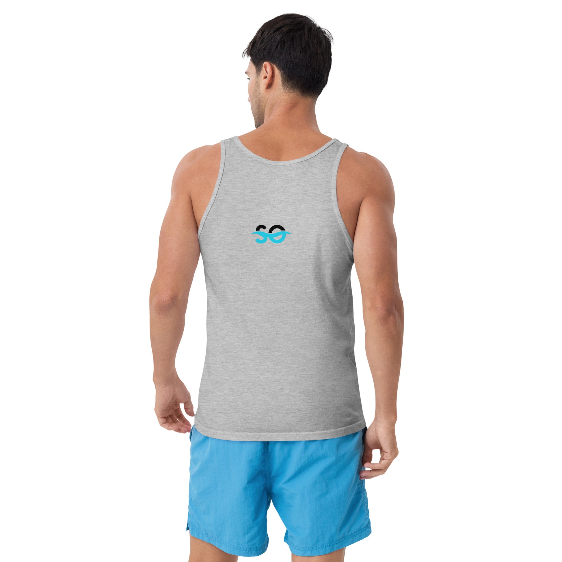 a man wearing a grey tank top with a blue logo