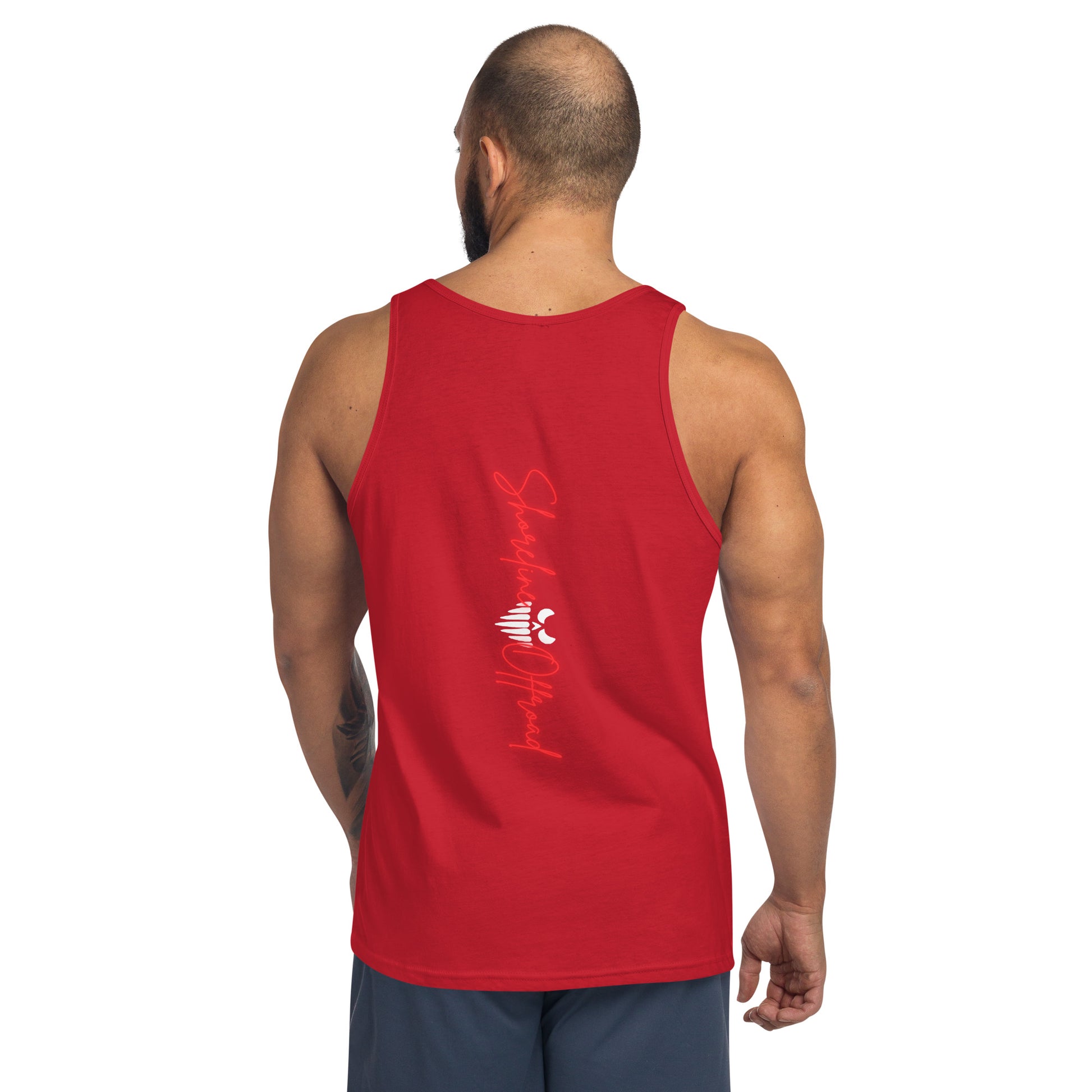 a man wearing a red tank top with a white logo on it