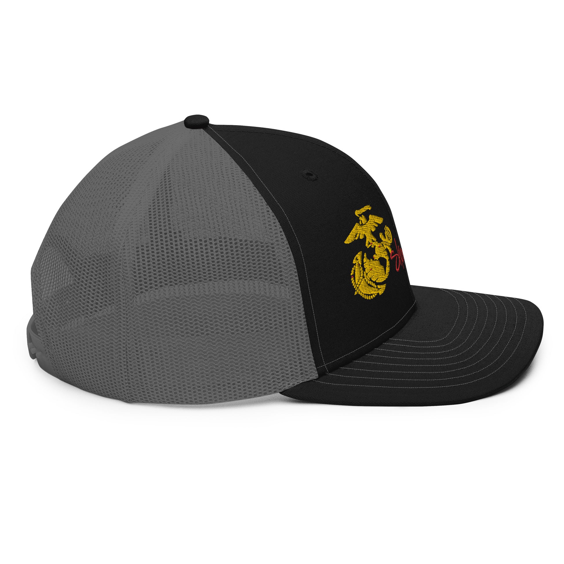 a black and grey hat with a yellow emblem