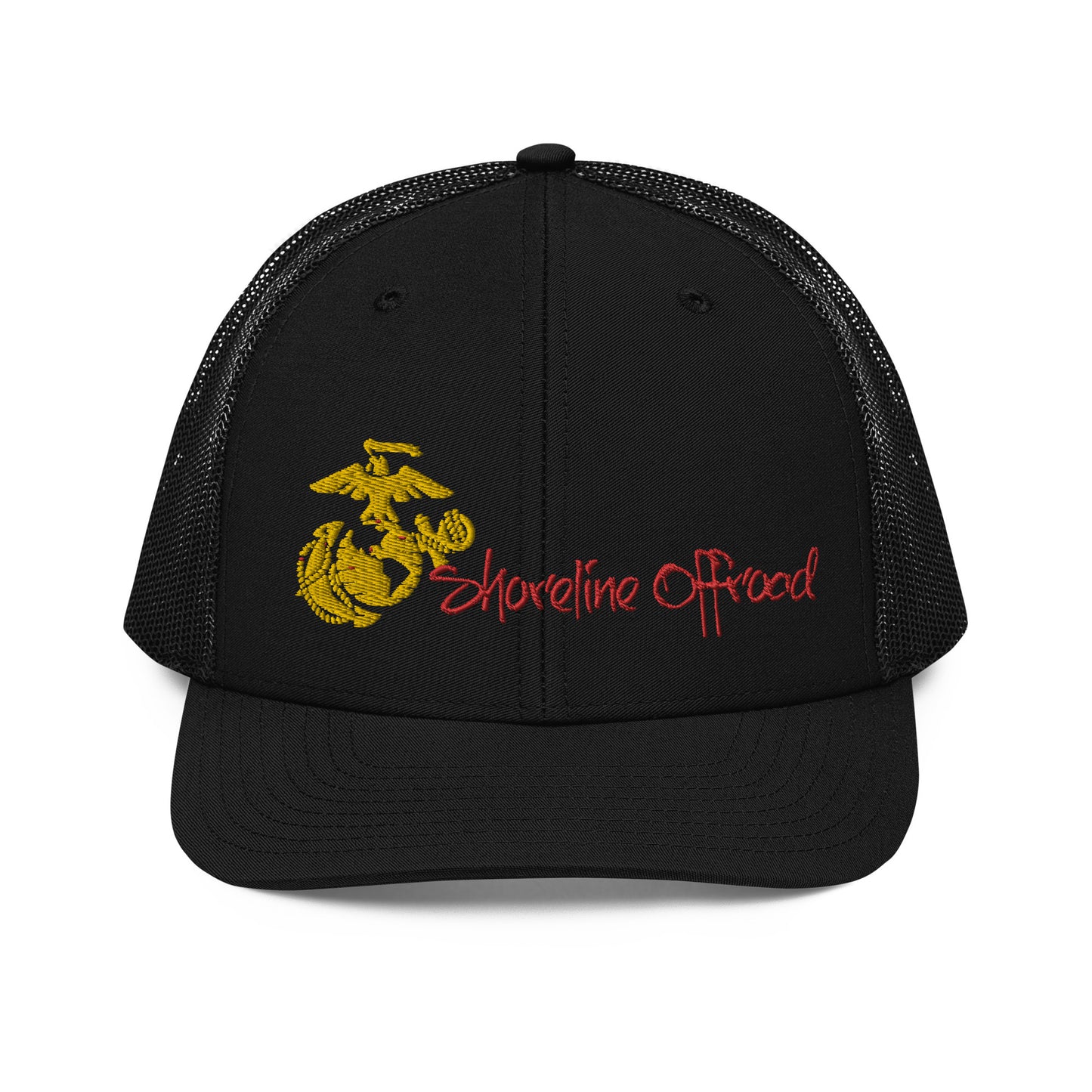 a black trucker hat with the marine emblem on it