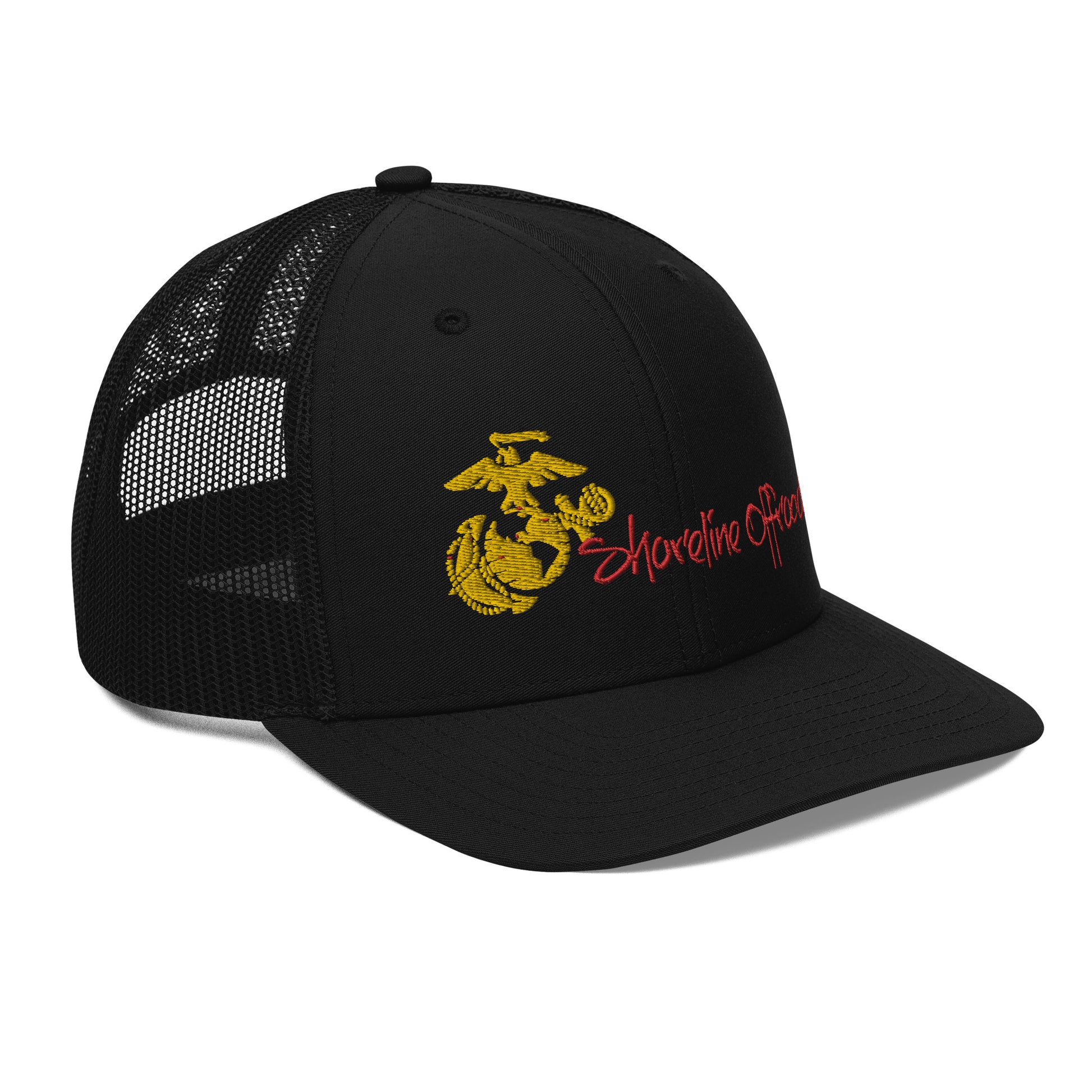 a black trucker hat with a yellow marine emblem