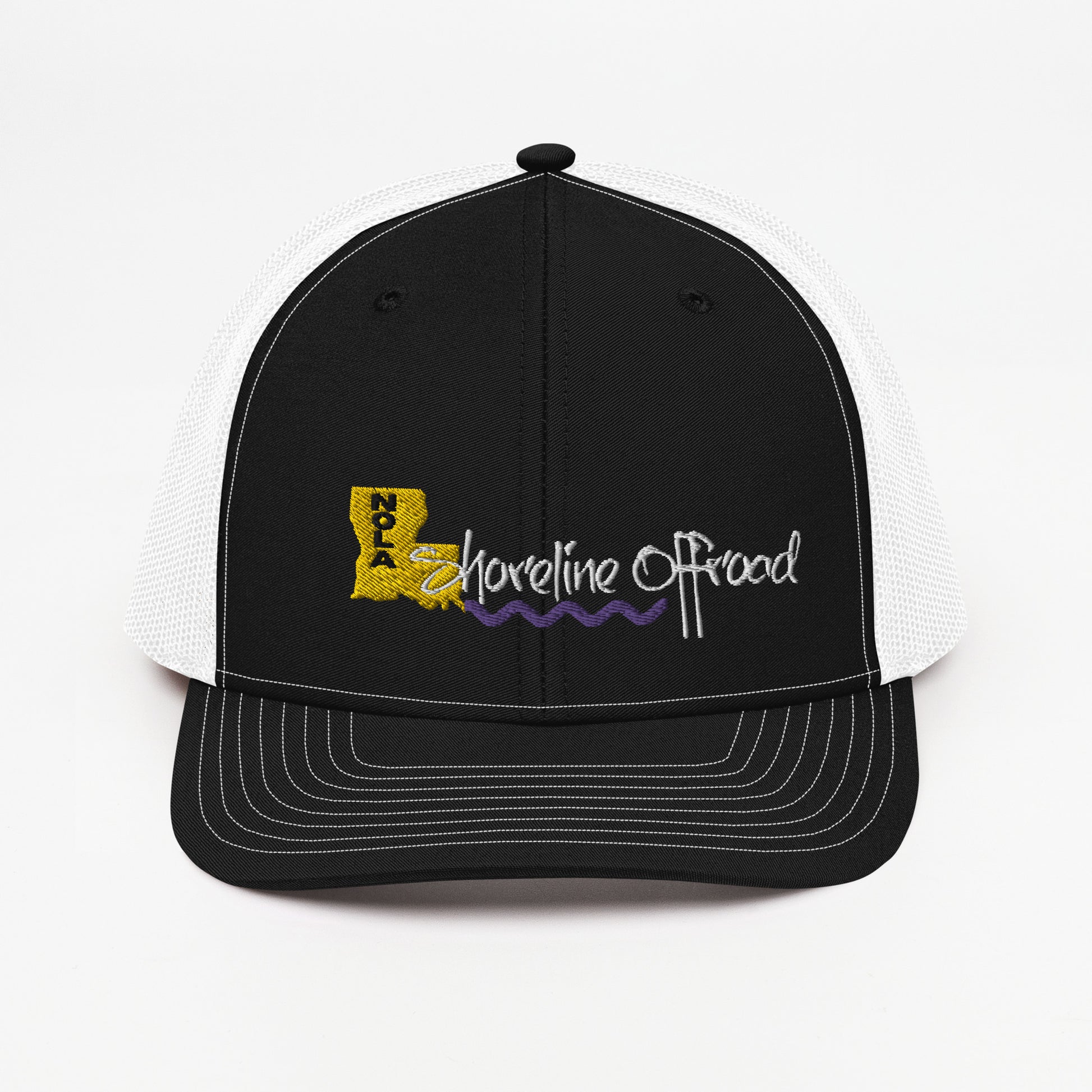 a black and white trucker hat with the words adventure on it