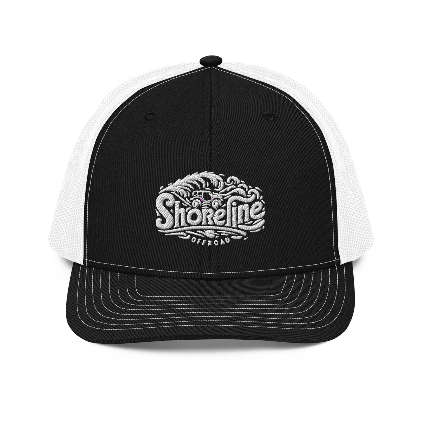 a black and white trucker hat with the words shoreline on it