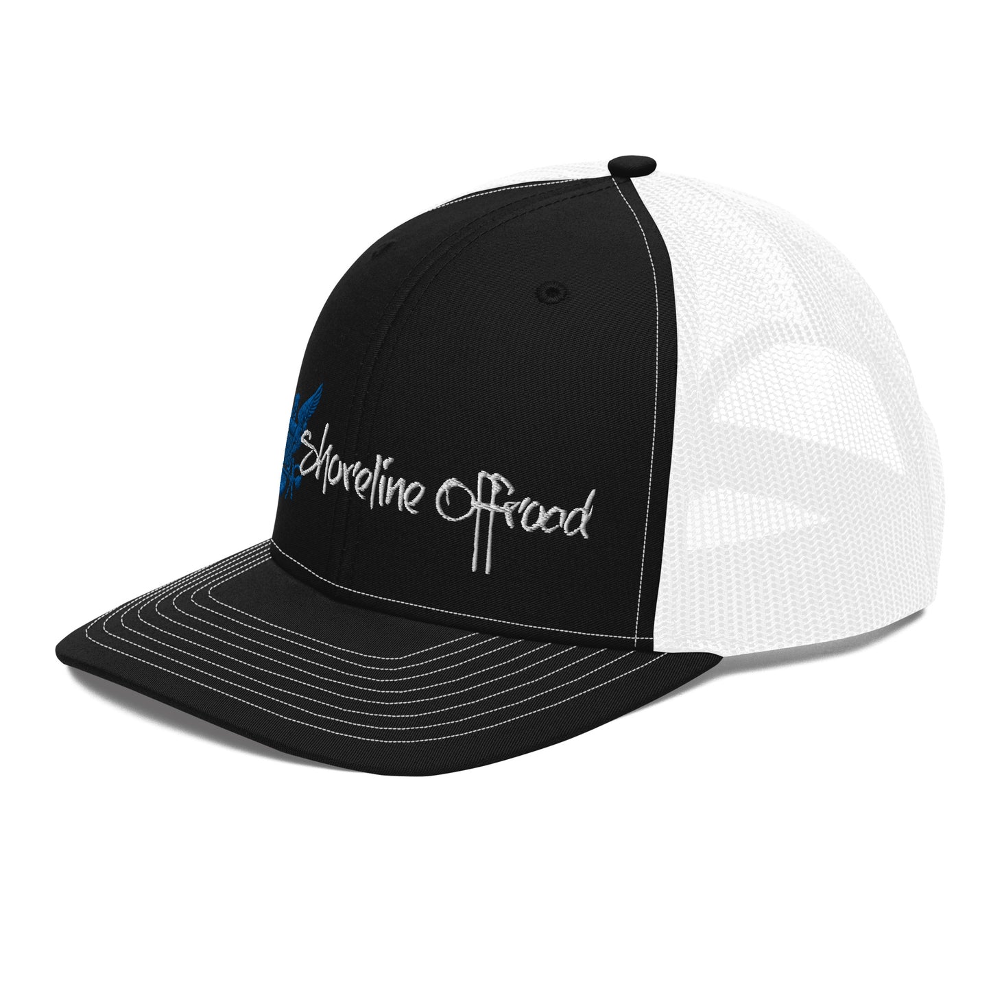 a black and white trucker hat with the words shoreline beach on it