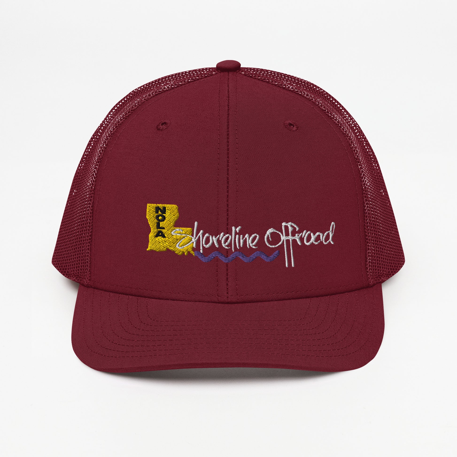 a maroon trucker hat with the words adventure on it