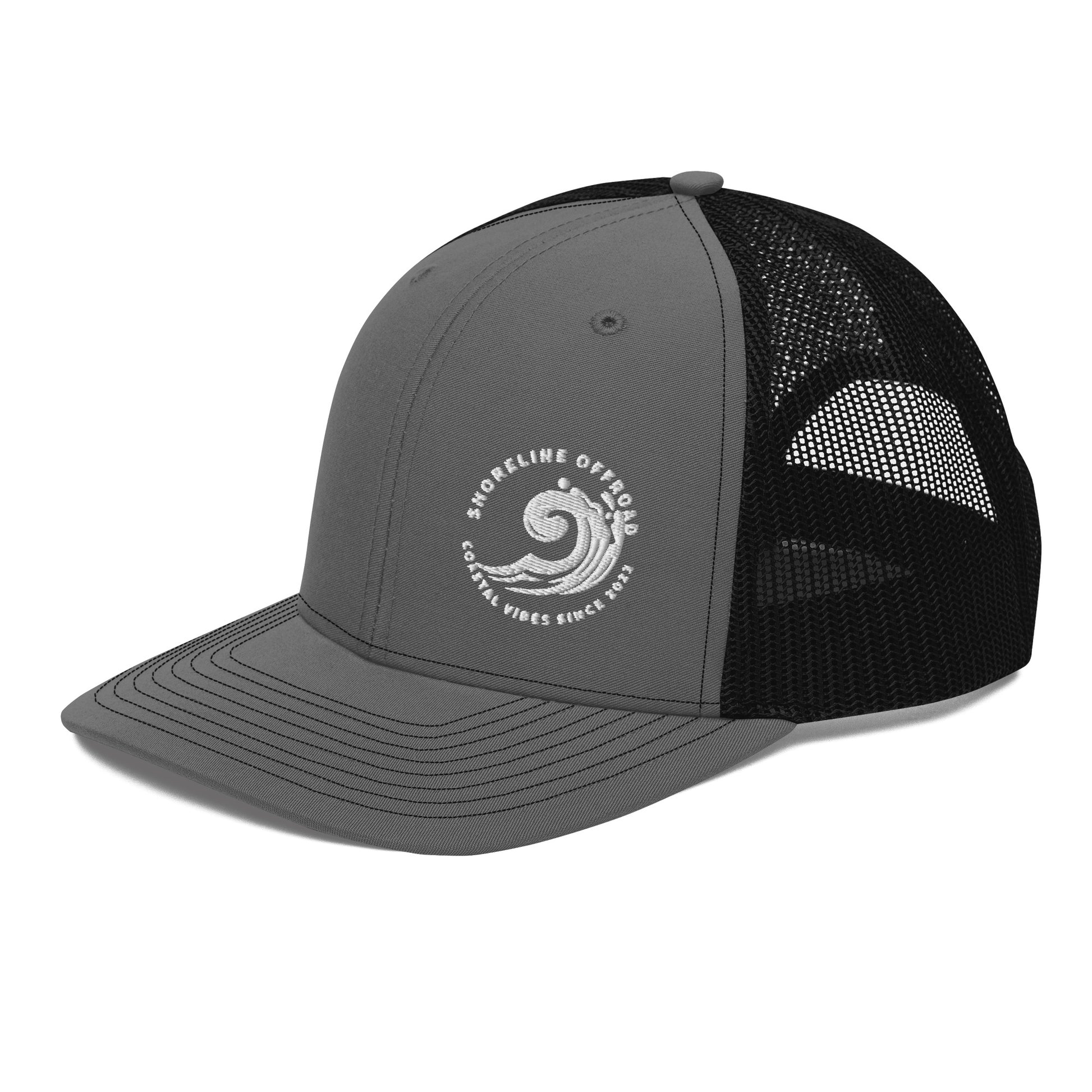 a grey and black trucker hat with a white logo