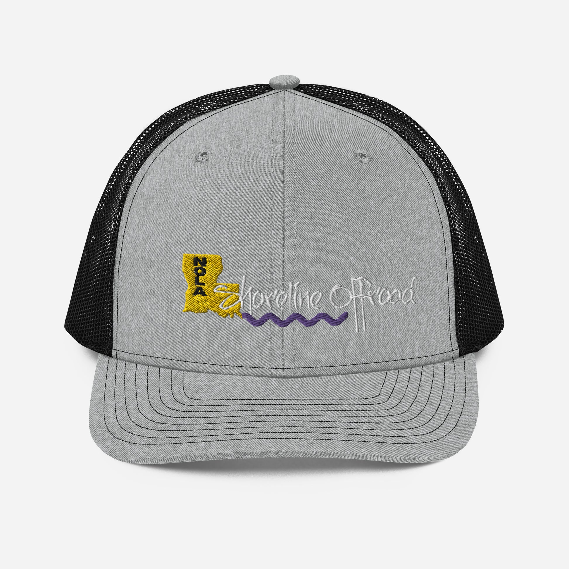 a gray and black trucker hat with the words adventure on it