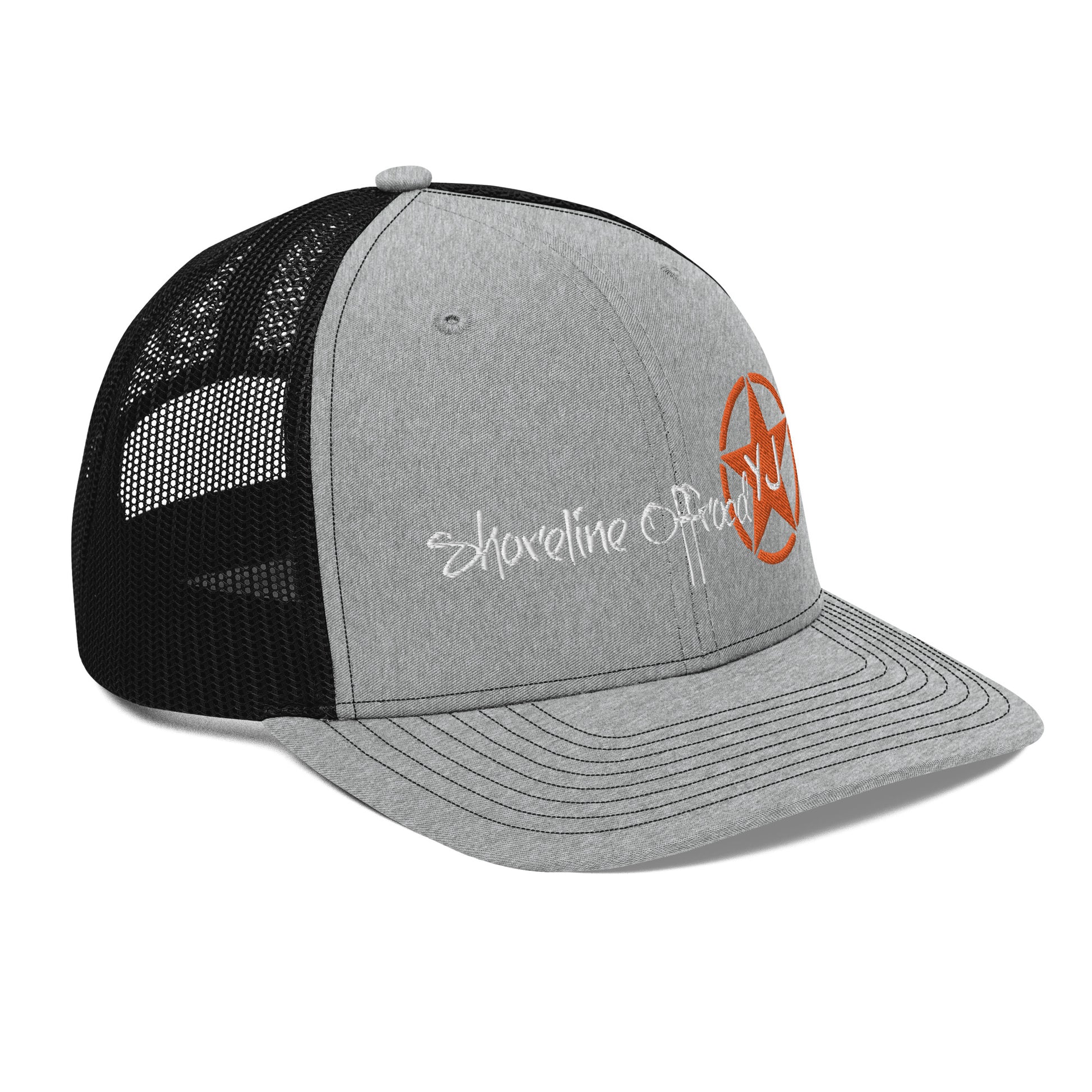 a grey and black trucker hat with an orange logo