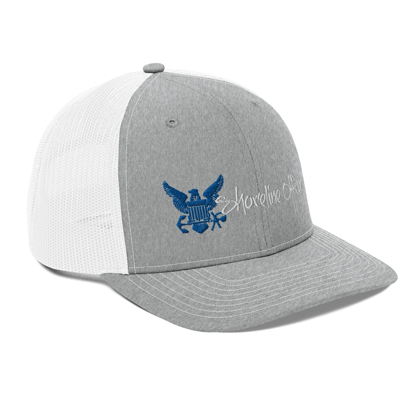 a gray and white hat with an eagle on it