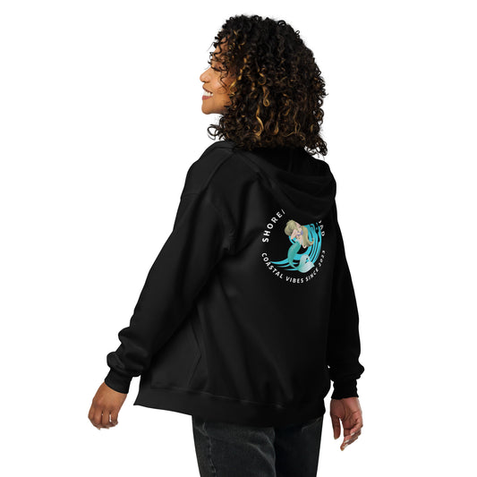 a woman wearing a black hoodie with a mermaid on it