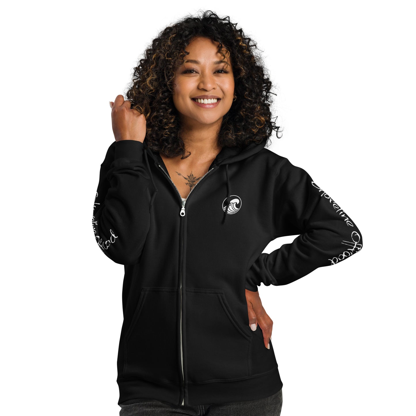 a woman wearing a black hoodie with a peace sign on it