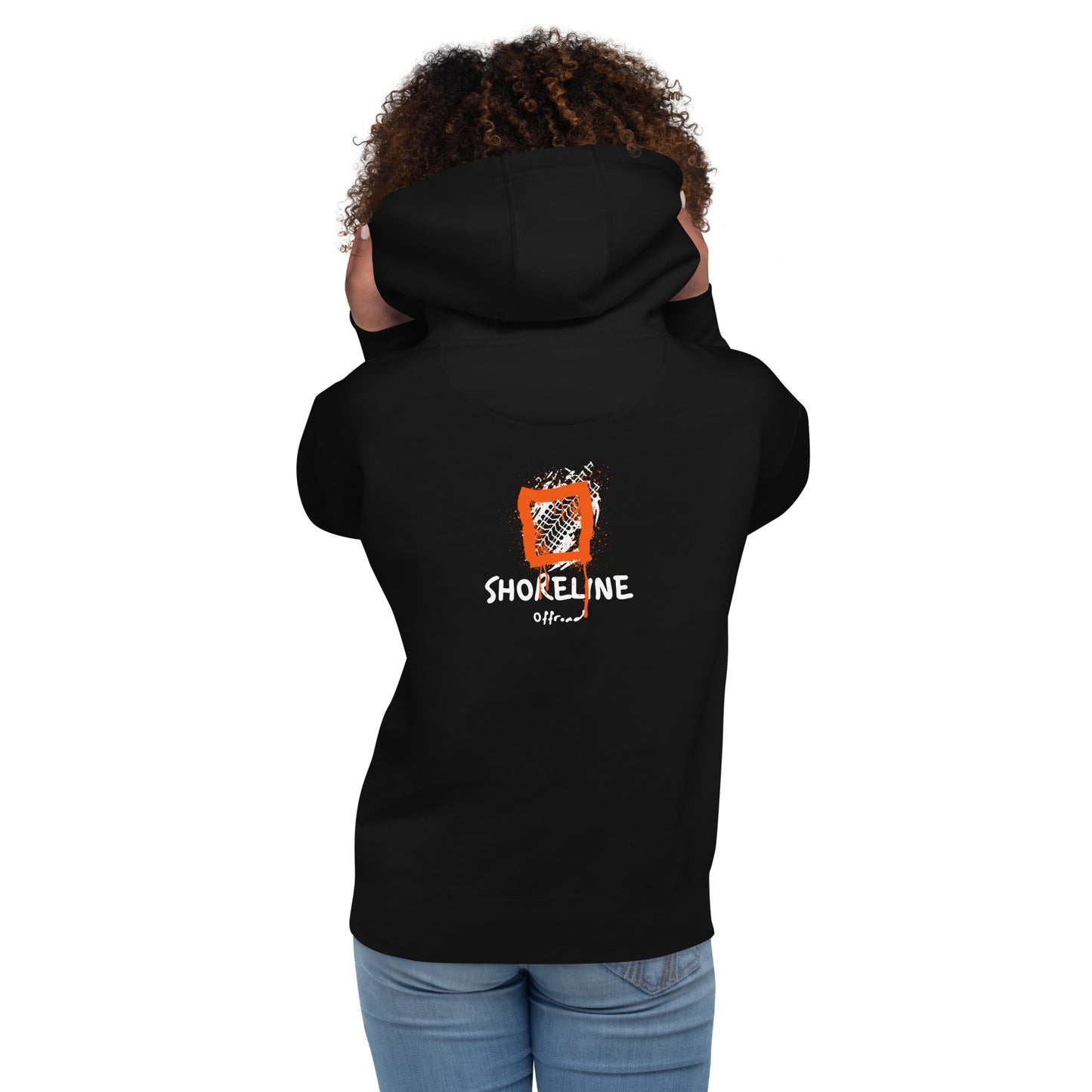 a woman wearing a black hoodie with the logo of a hockey team