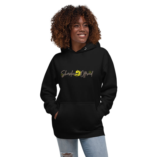 a woman wearing a black hoodie with a smile on it