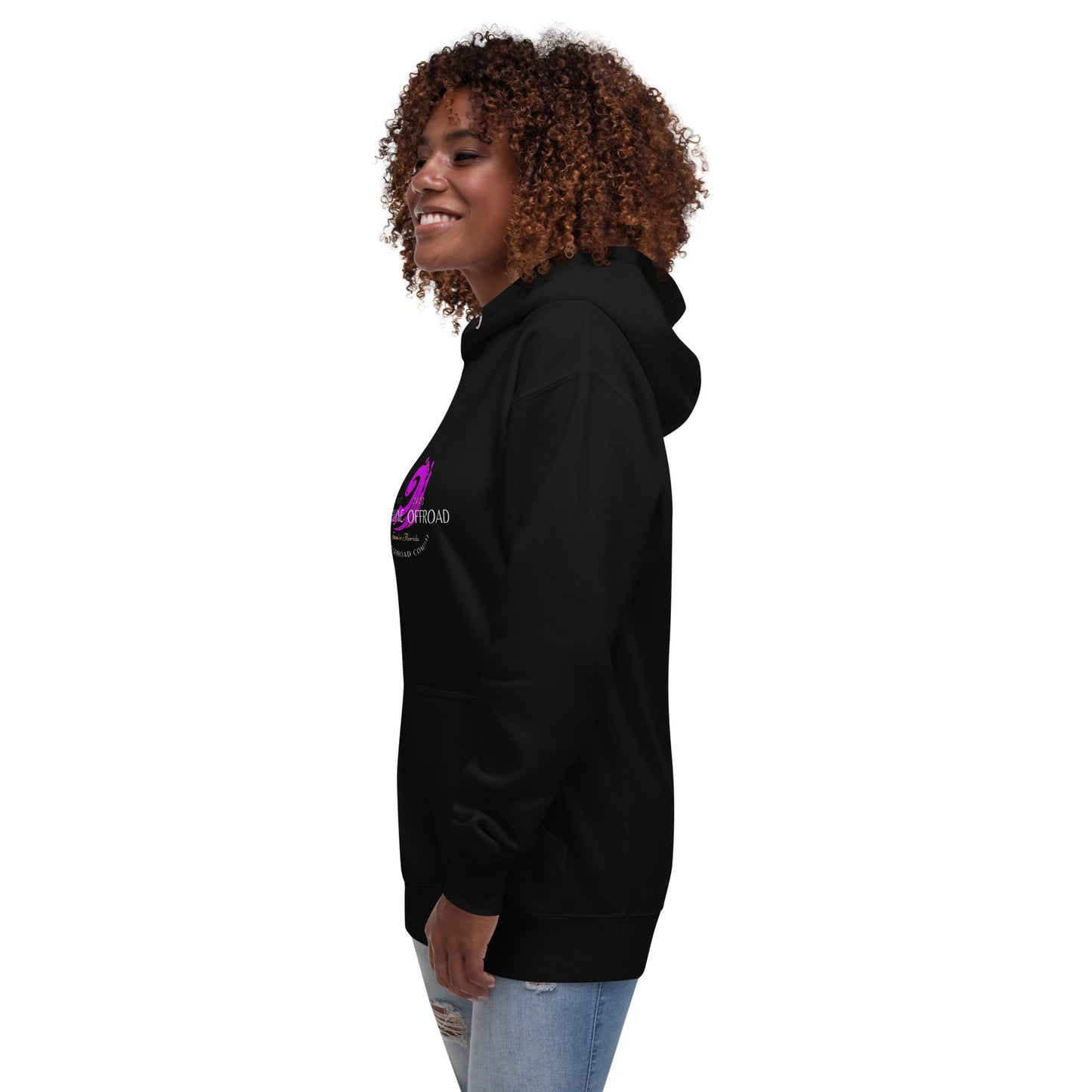 a woman with curly hair wearing a black hoodie