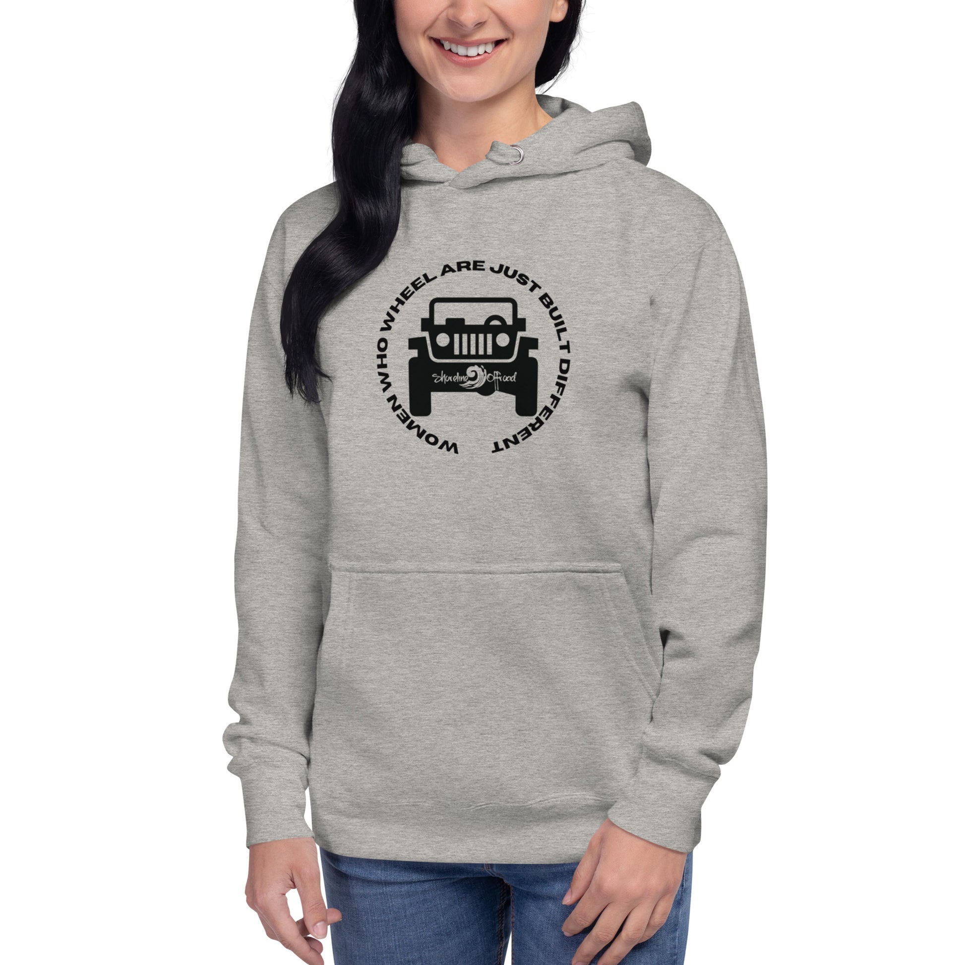 a woman wearing a grey hoodie with a jeep on it