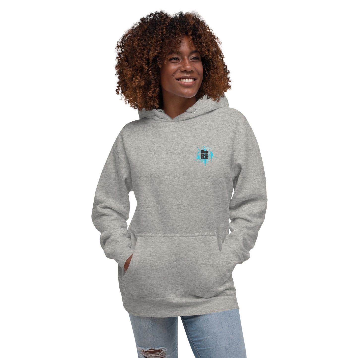 a woman wearing a grey hoodie with a blue cross on it