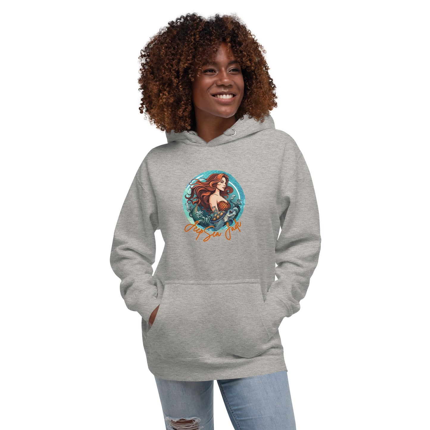 a woman wearing a gray hoodie with a picture of a mermaid on it