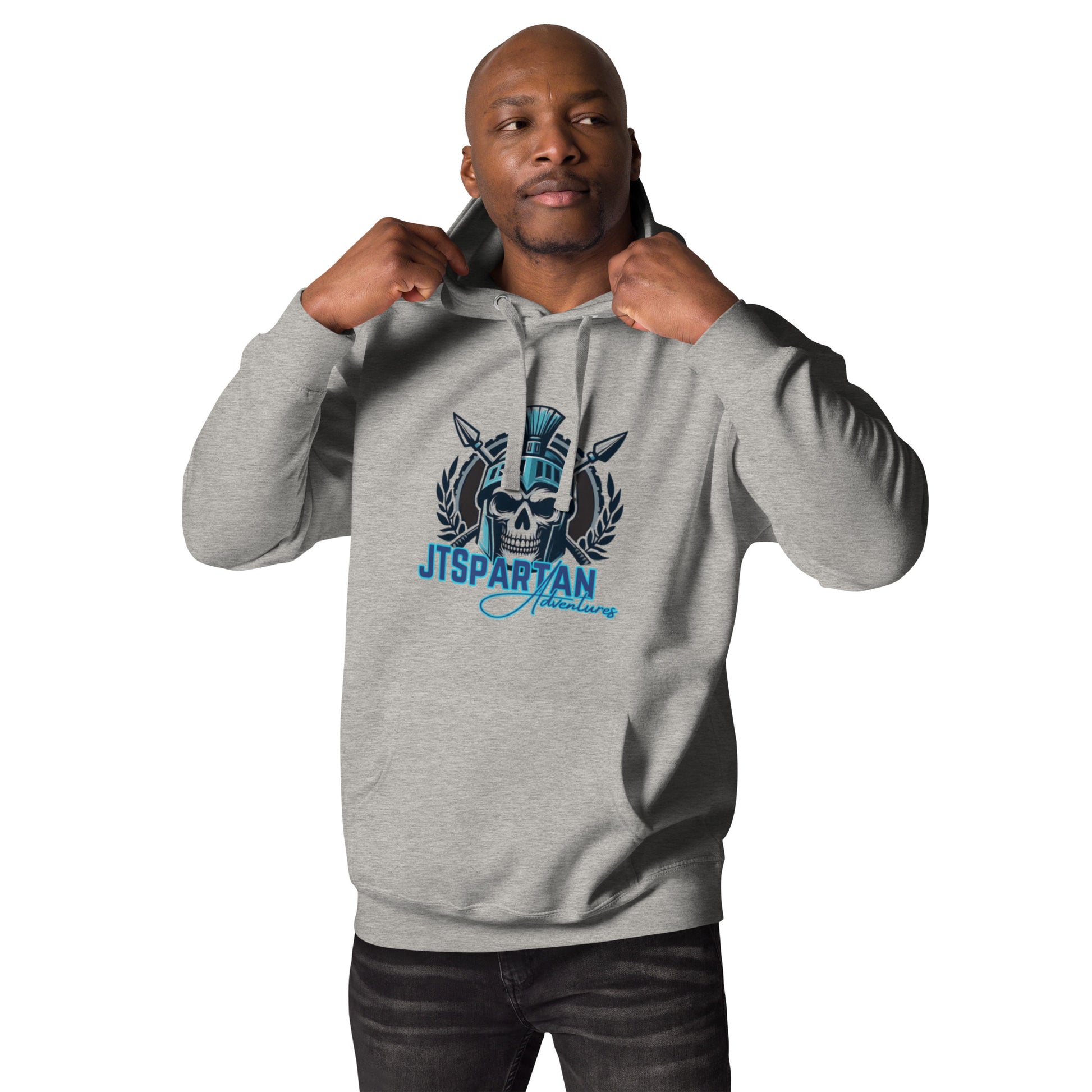a man in a grey hoodie is posing for a picture