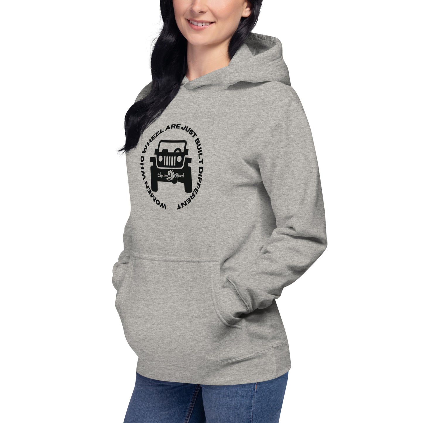 a woman wearing a grey hoodie with a tractor on it