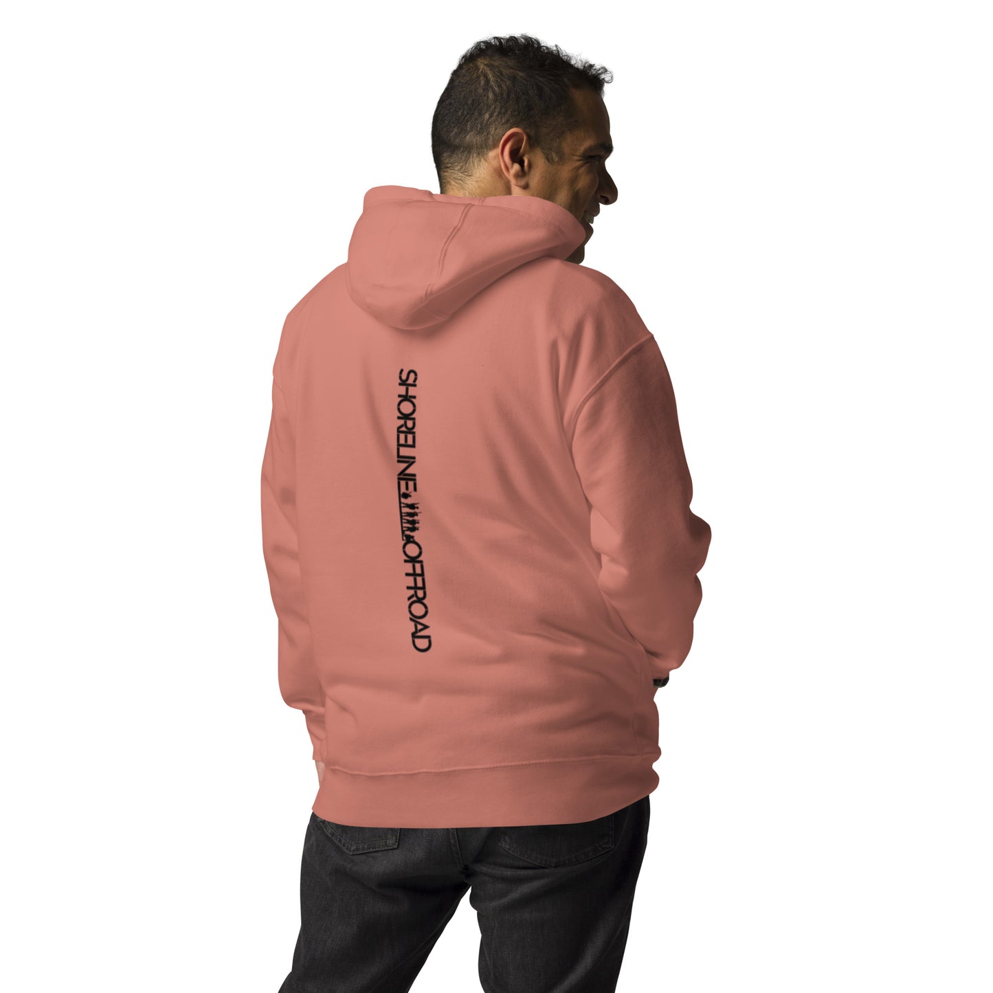 a man wearing a pink hoodie with a black print on it