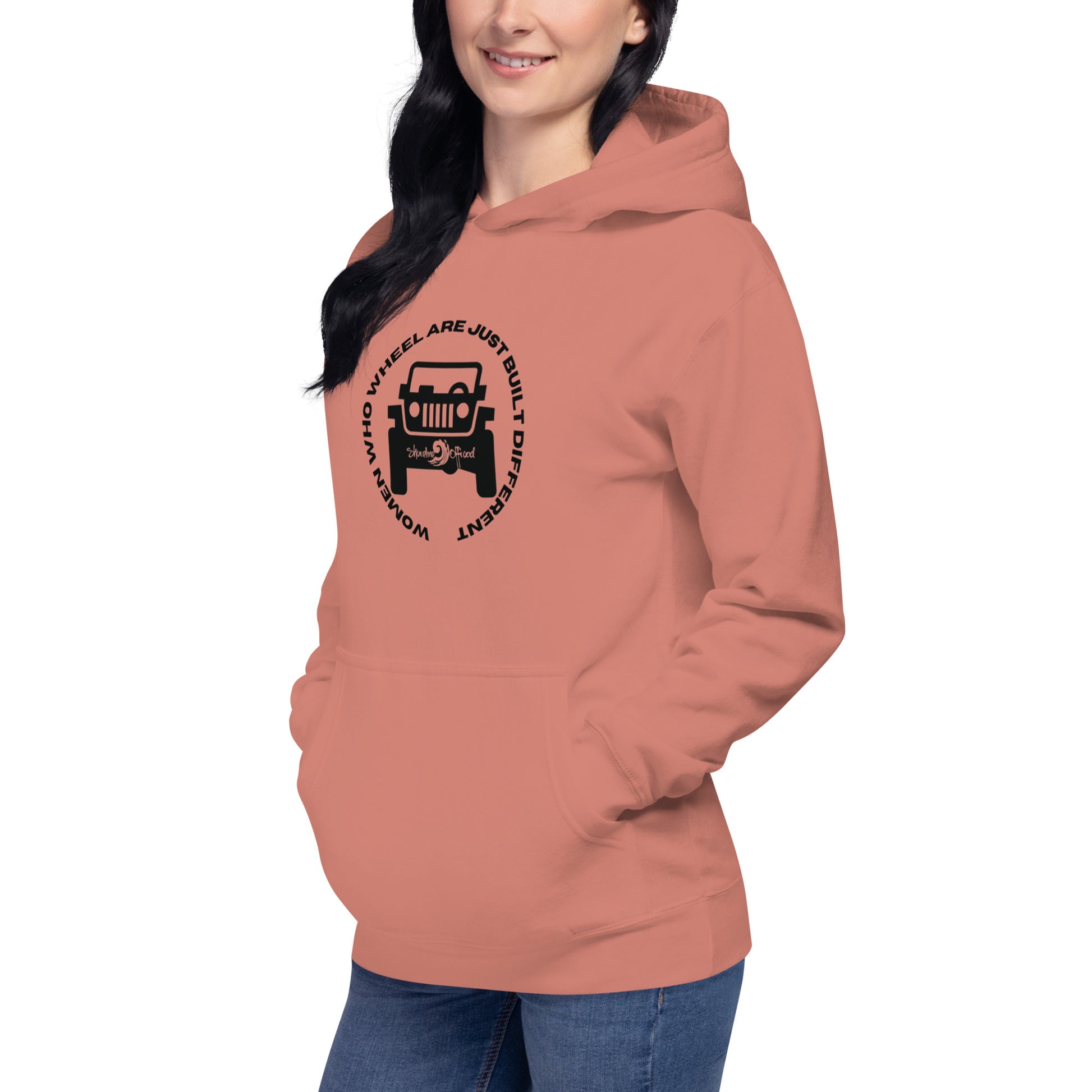 a woman wearing a pink hoodie with a tractor on it
