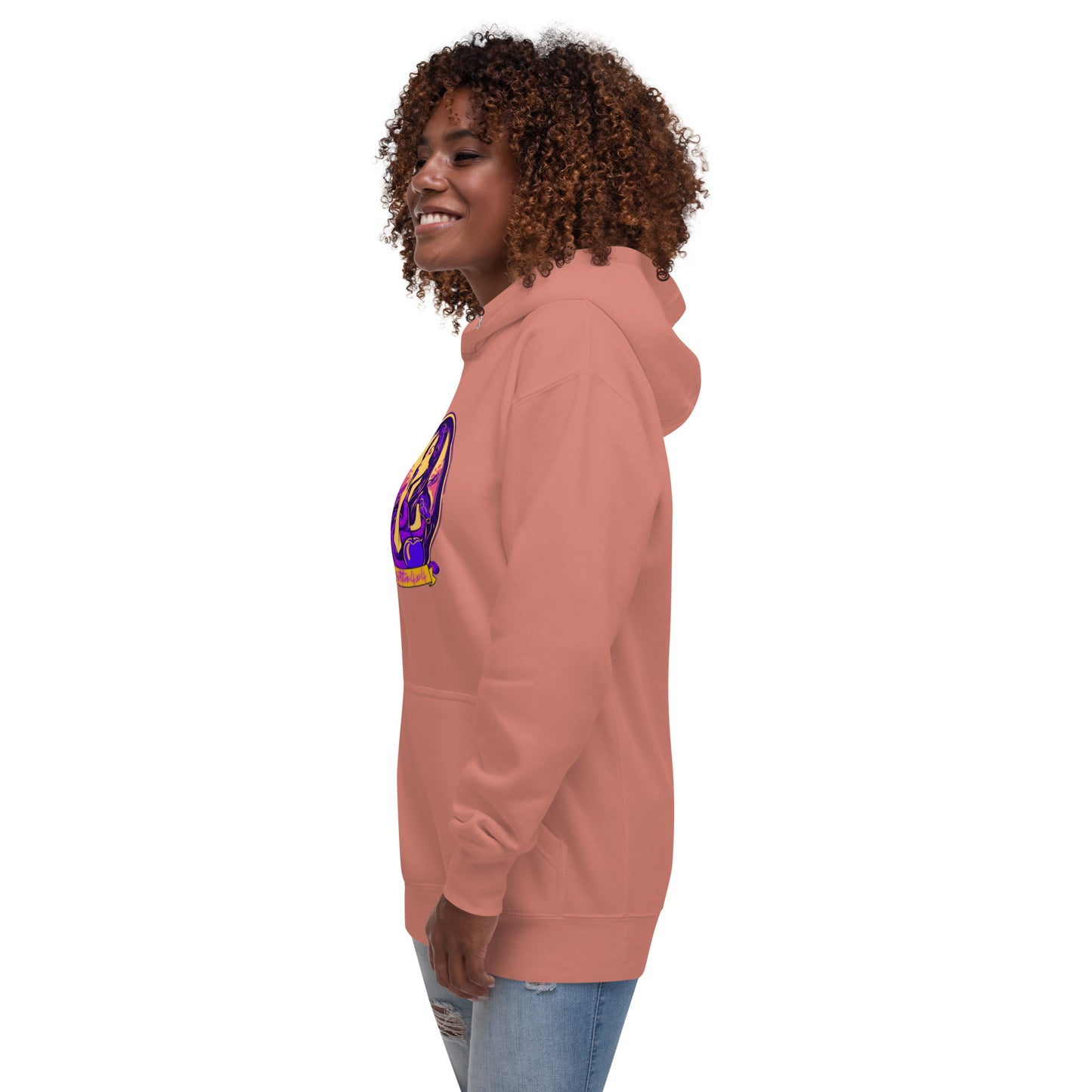 a woman wearing a pink hoodie with a purple and blue design on it