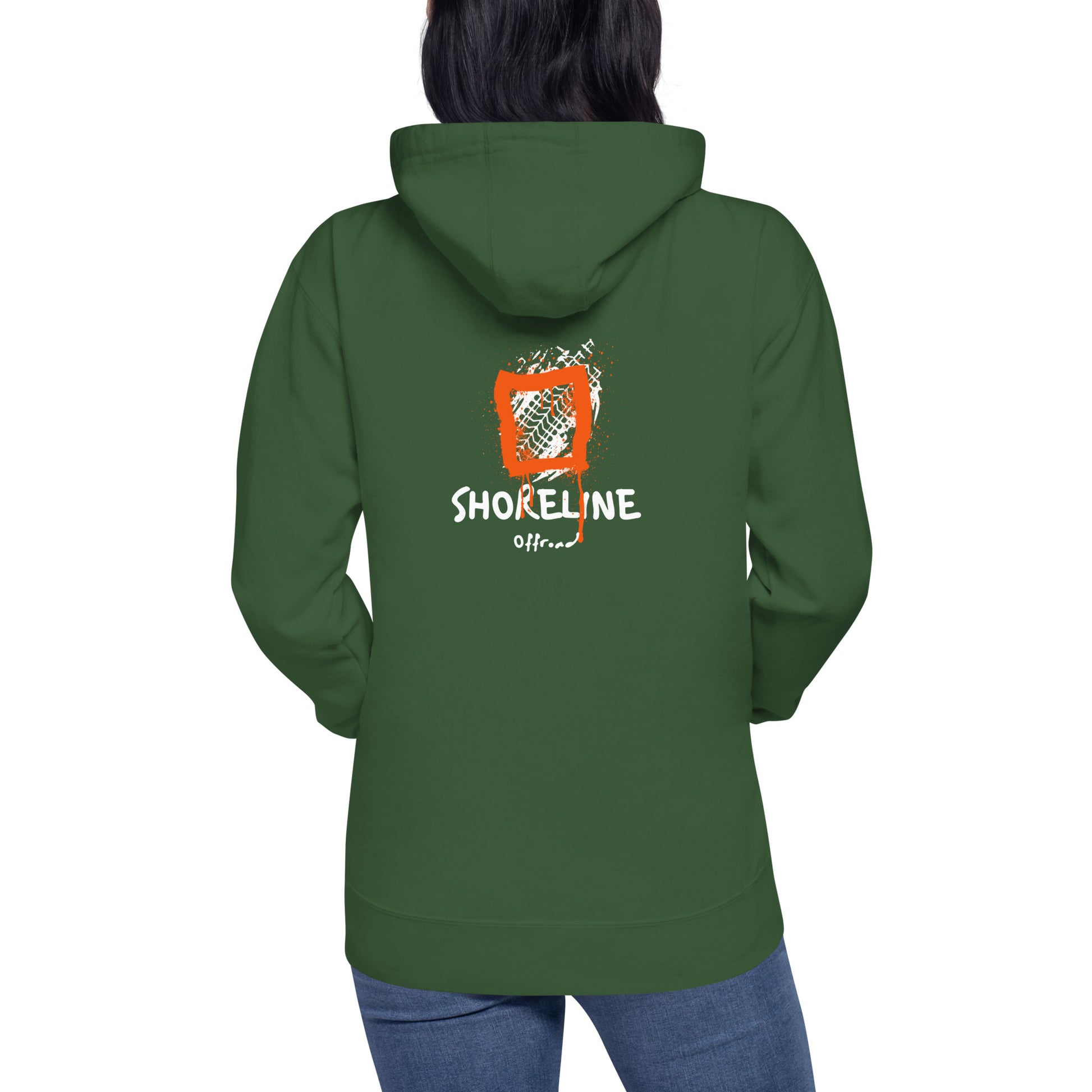 a woman wearing a green hoodie with a lion on it