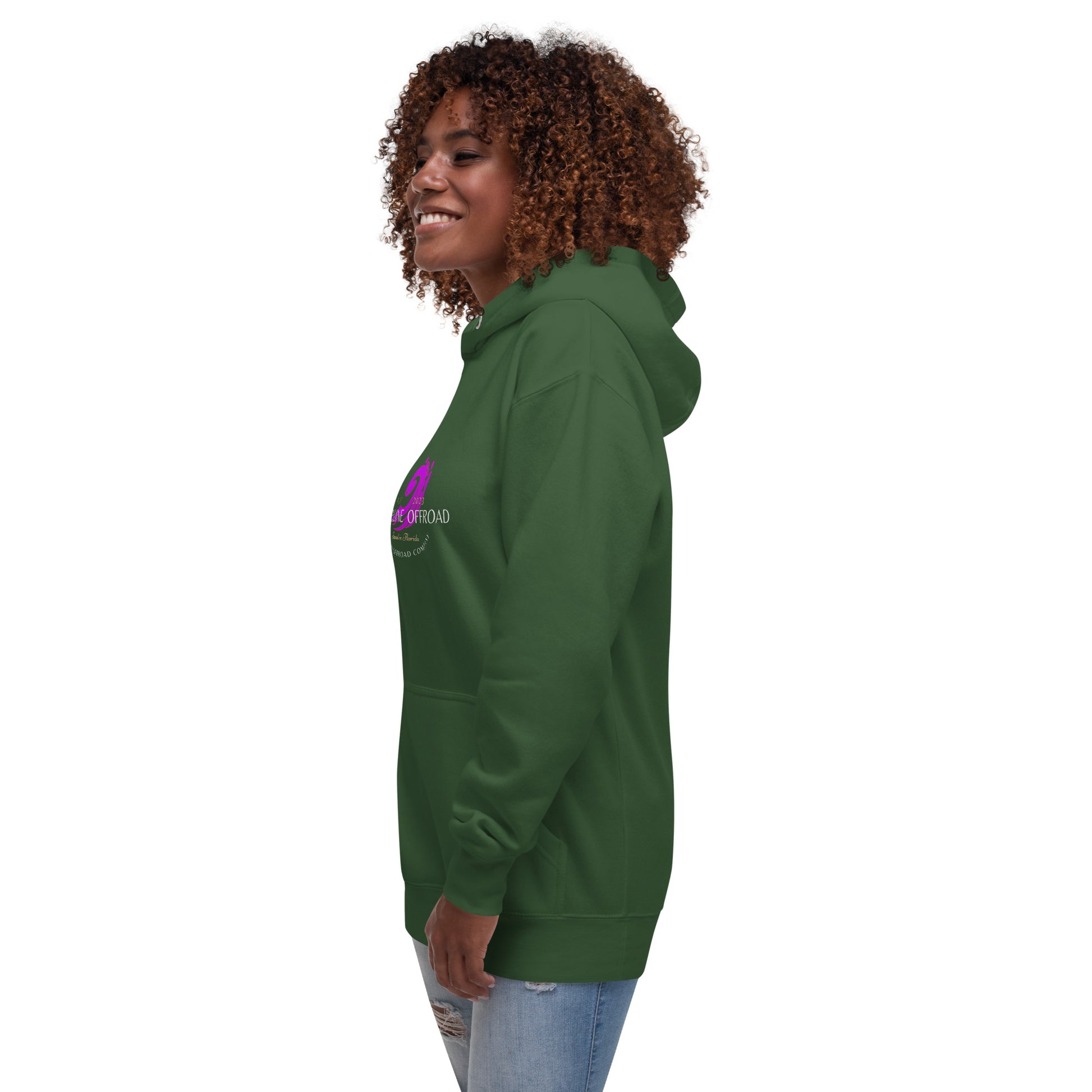 a woman wearing a green hoodie with a purple logo