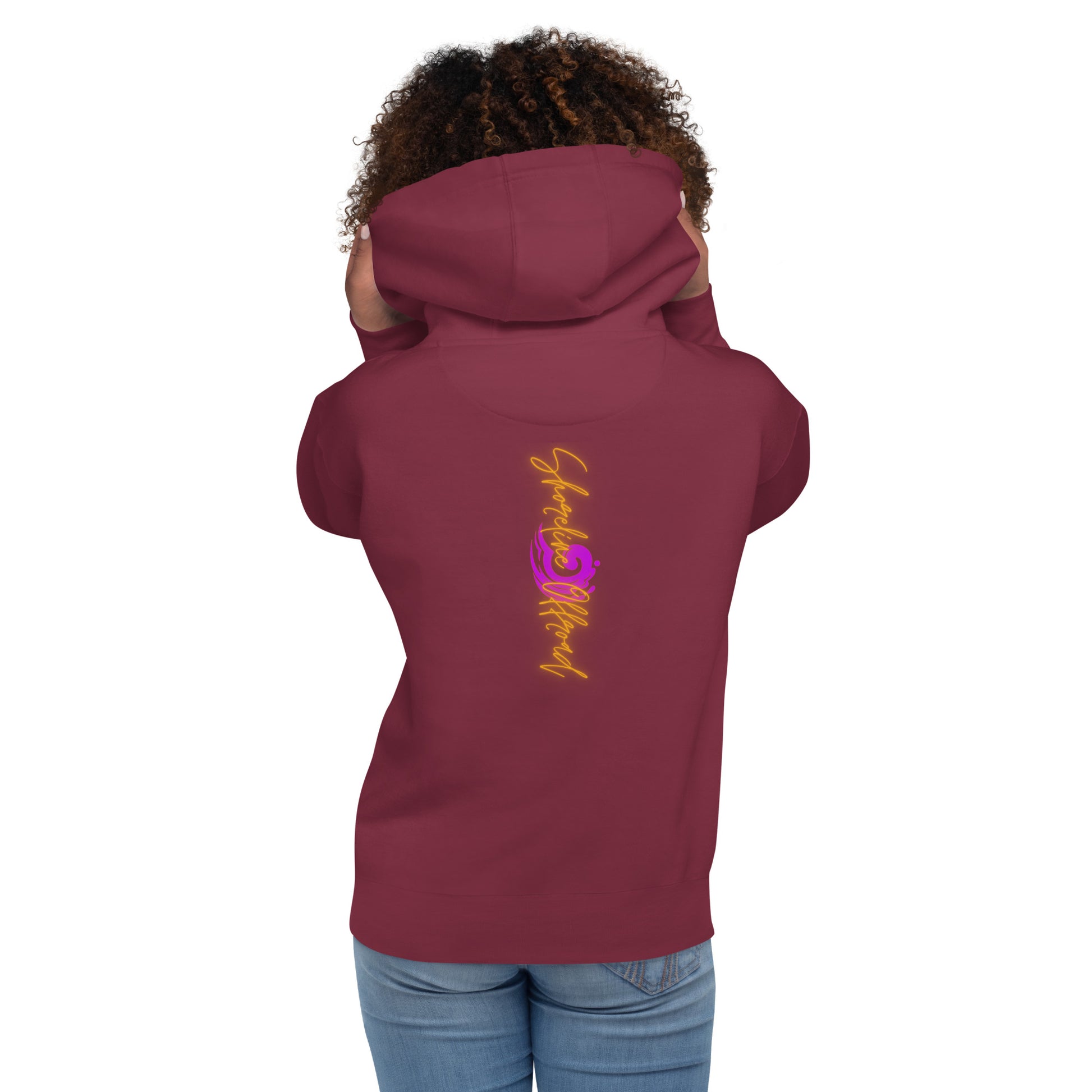 a woman wearing a hoodie with a dragon on it