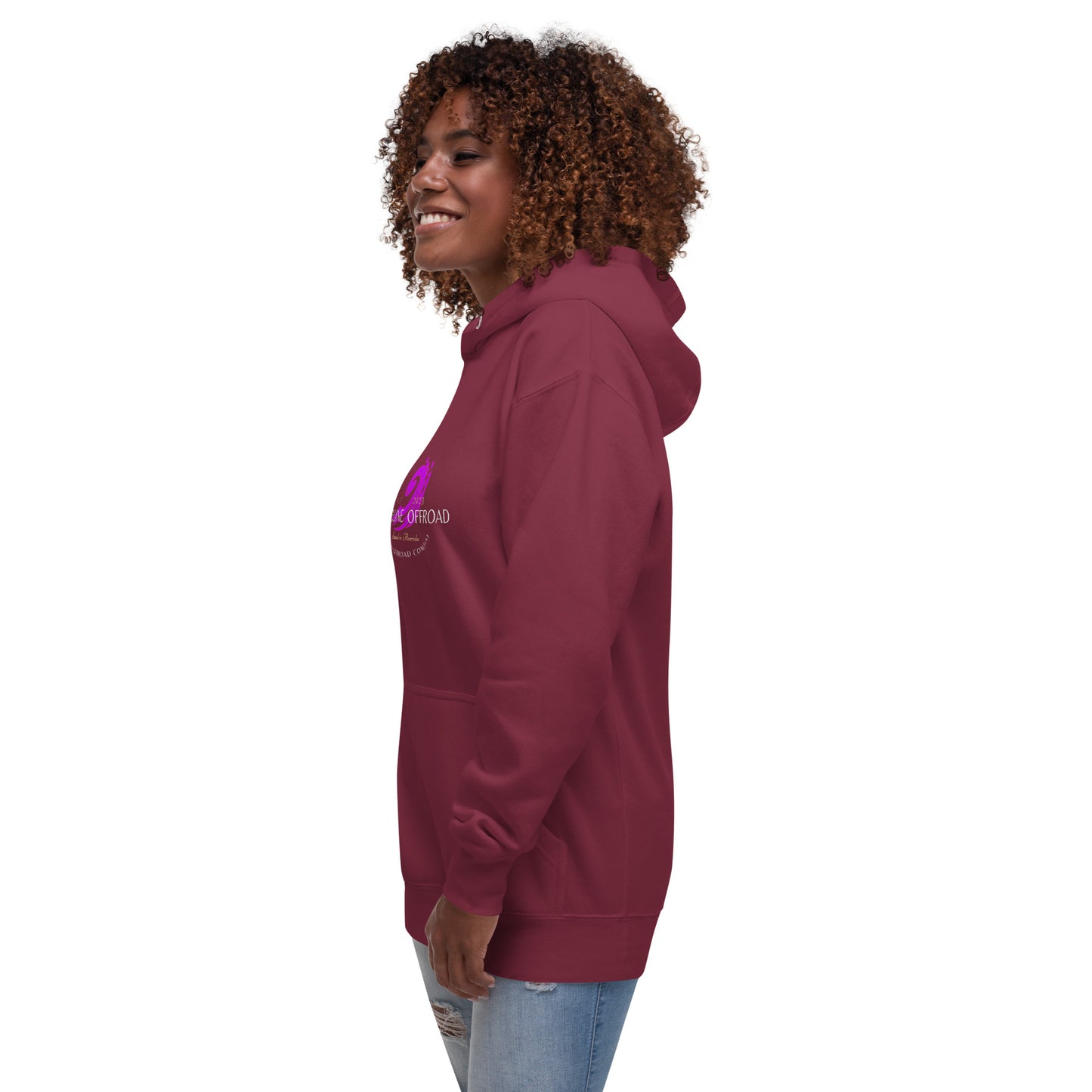 a woman wearing a maroon hoodie with a purple logo