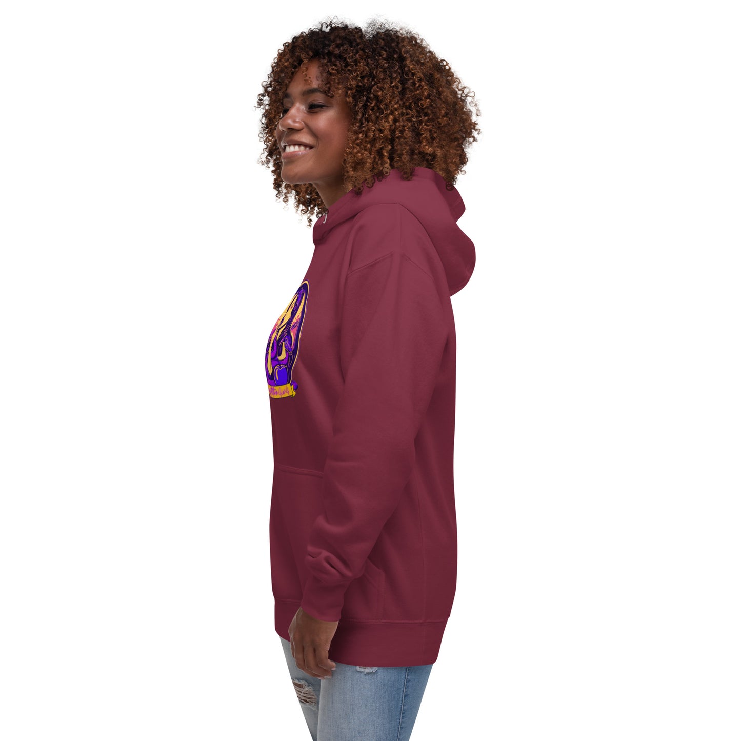 a woman wearing a maroon hoodie with a purple and yellow logo